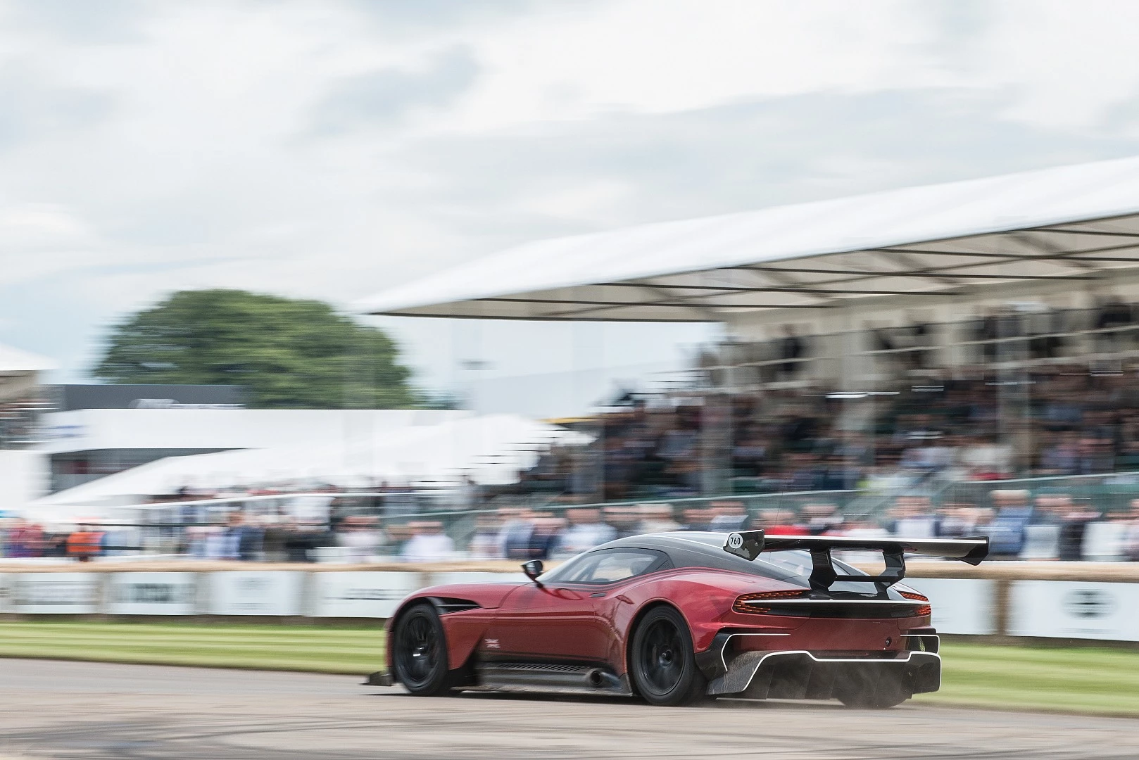 The stunning Aston Martin Vulcan hammers up the hill at Goodwood