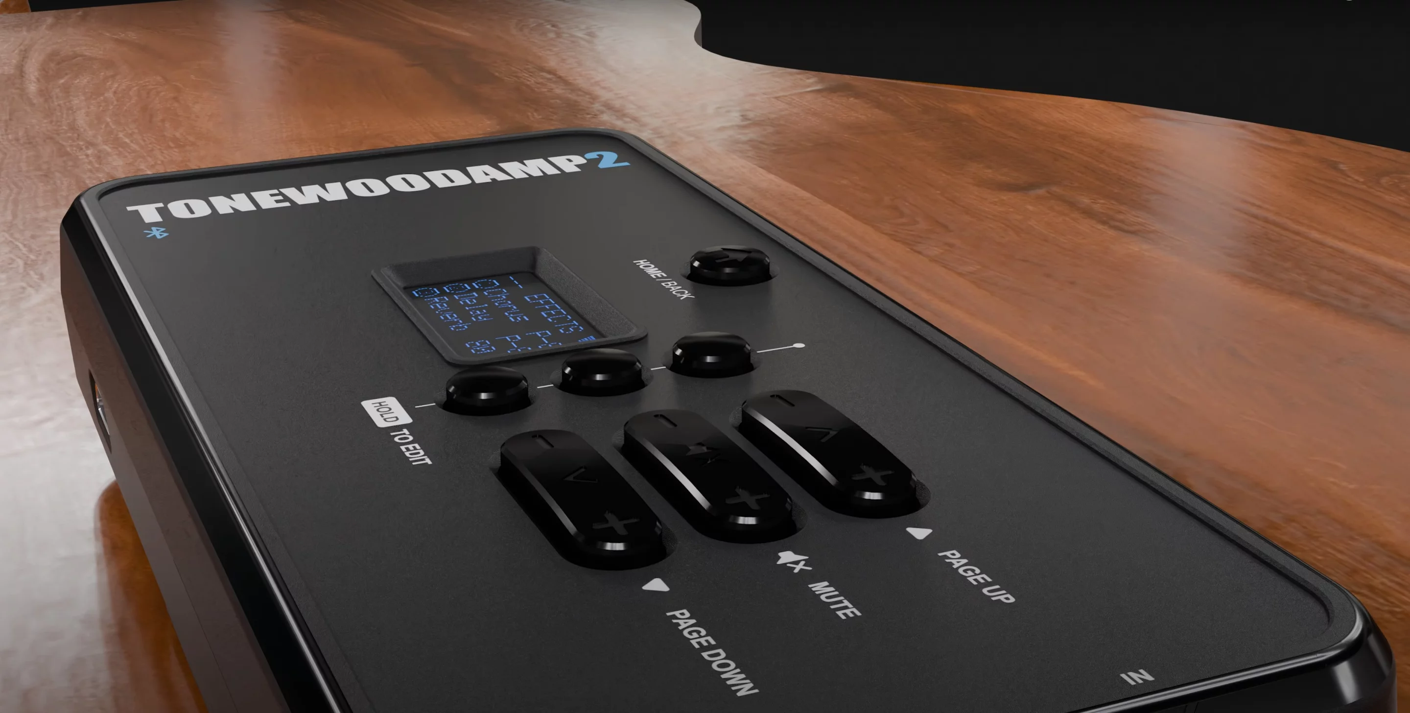 The ToneWoodAmp 2 magnetically mounts to the back of any acoustic, and generates effects like chorus, reverb and delay that are pushed through the sound hole as the strings are picked