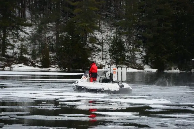 The AirRider hovercraft traveling over open water and ice