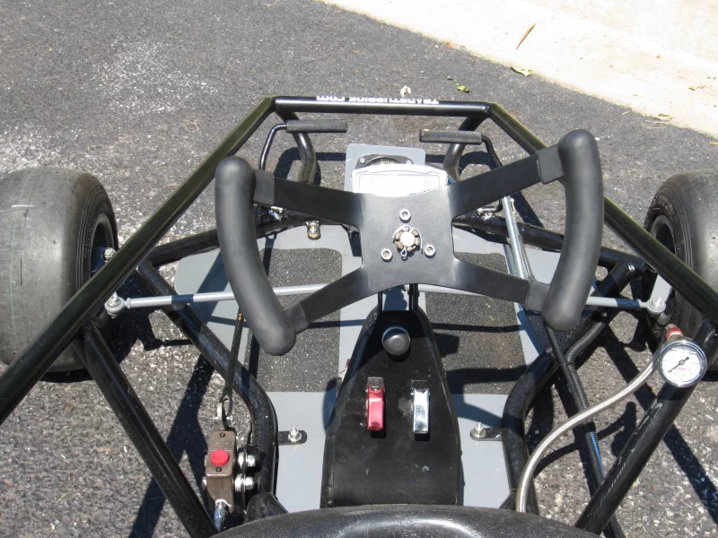 The kart's butterfly steering wheel