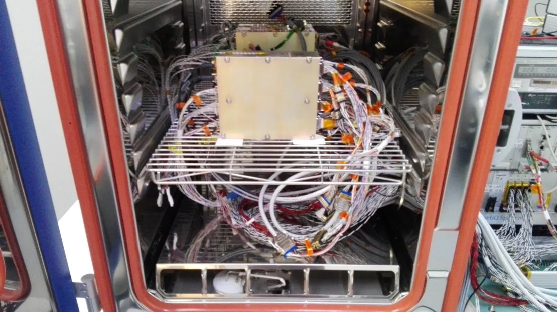 The engineering model of Hera's onboard computer being prepared for environmental testing at QinetiQ Space's facility in Kruibeke, Belgium