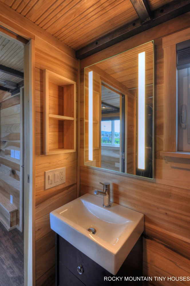 The Pemberley's bathroom includes a vanity unit, large shower and composting toilet