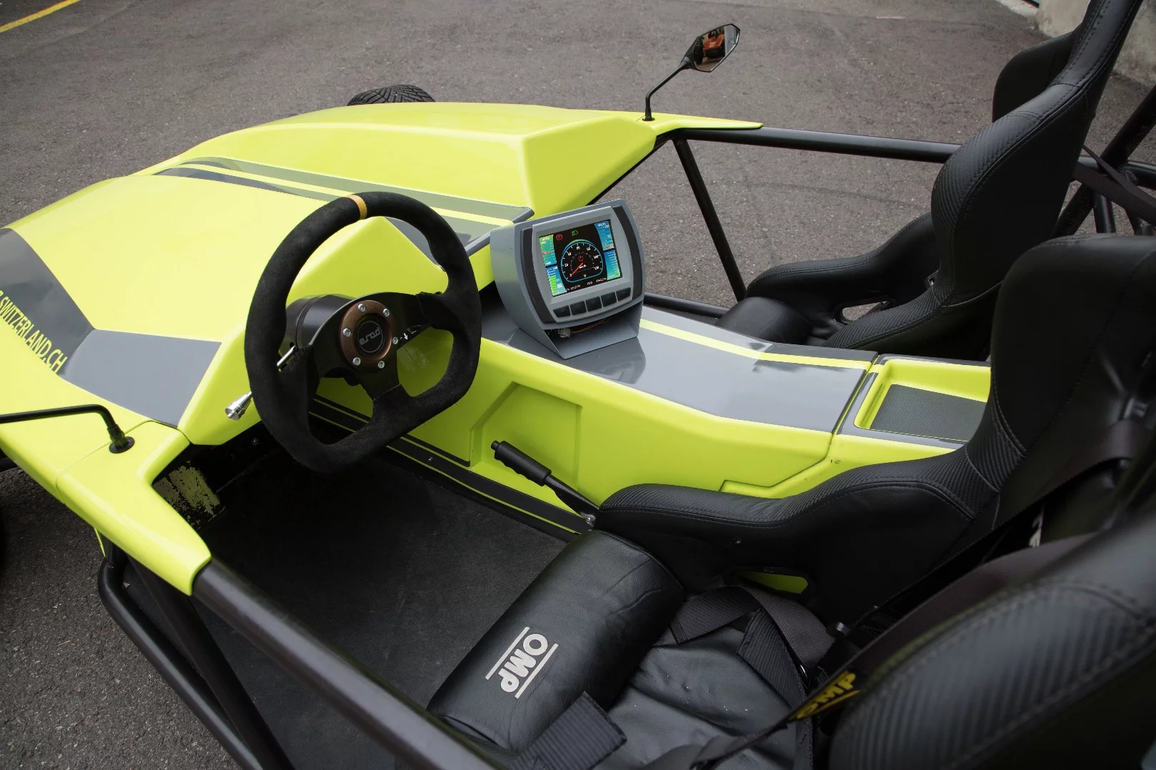 The cabin is stripped back, but the OMP seat is padded and comfortable