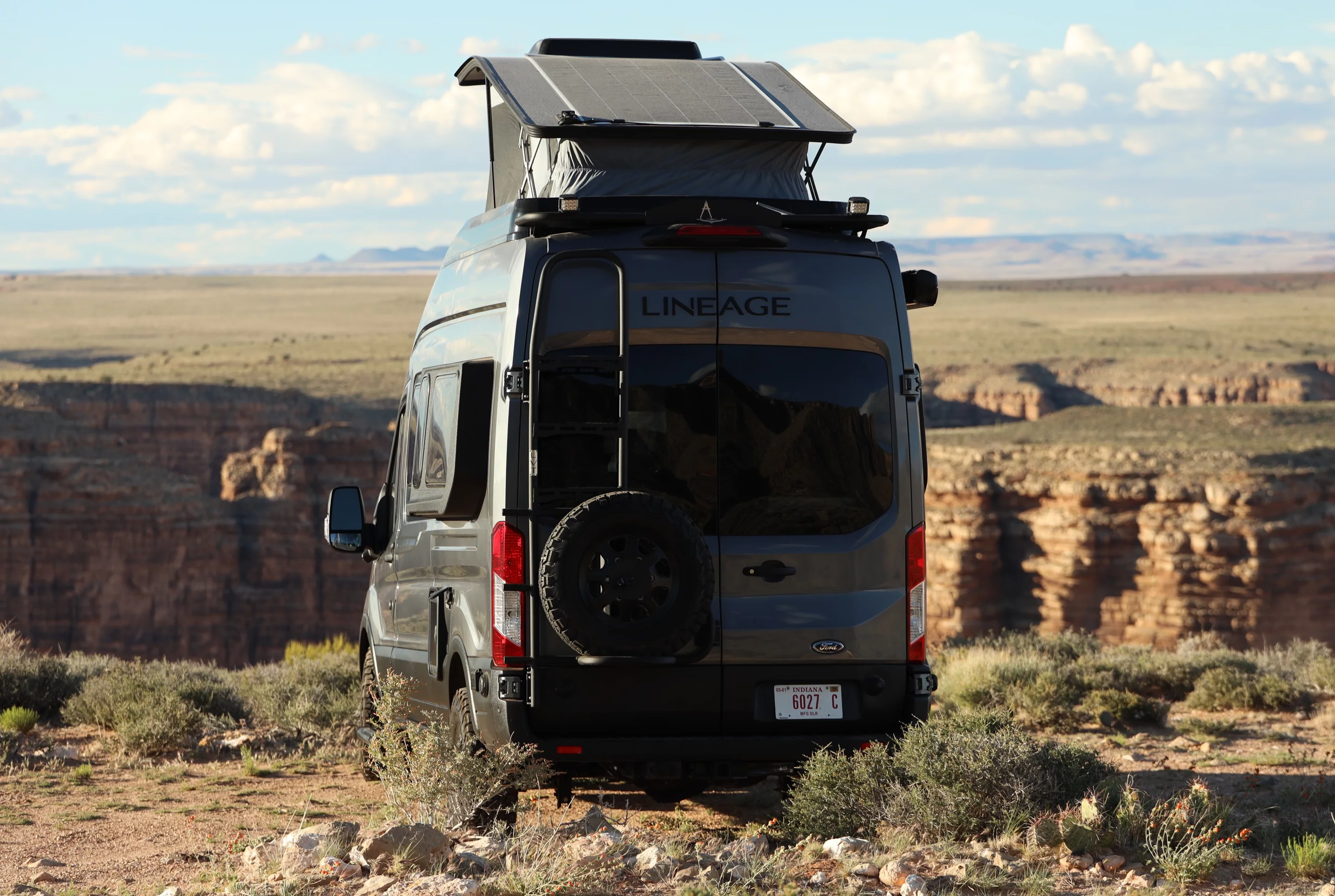 The optional pop-up roof creates a four-sleeper adventure camper van with 300 watts of solar charging mounted directly to the roof