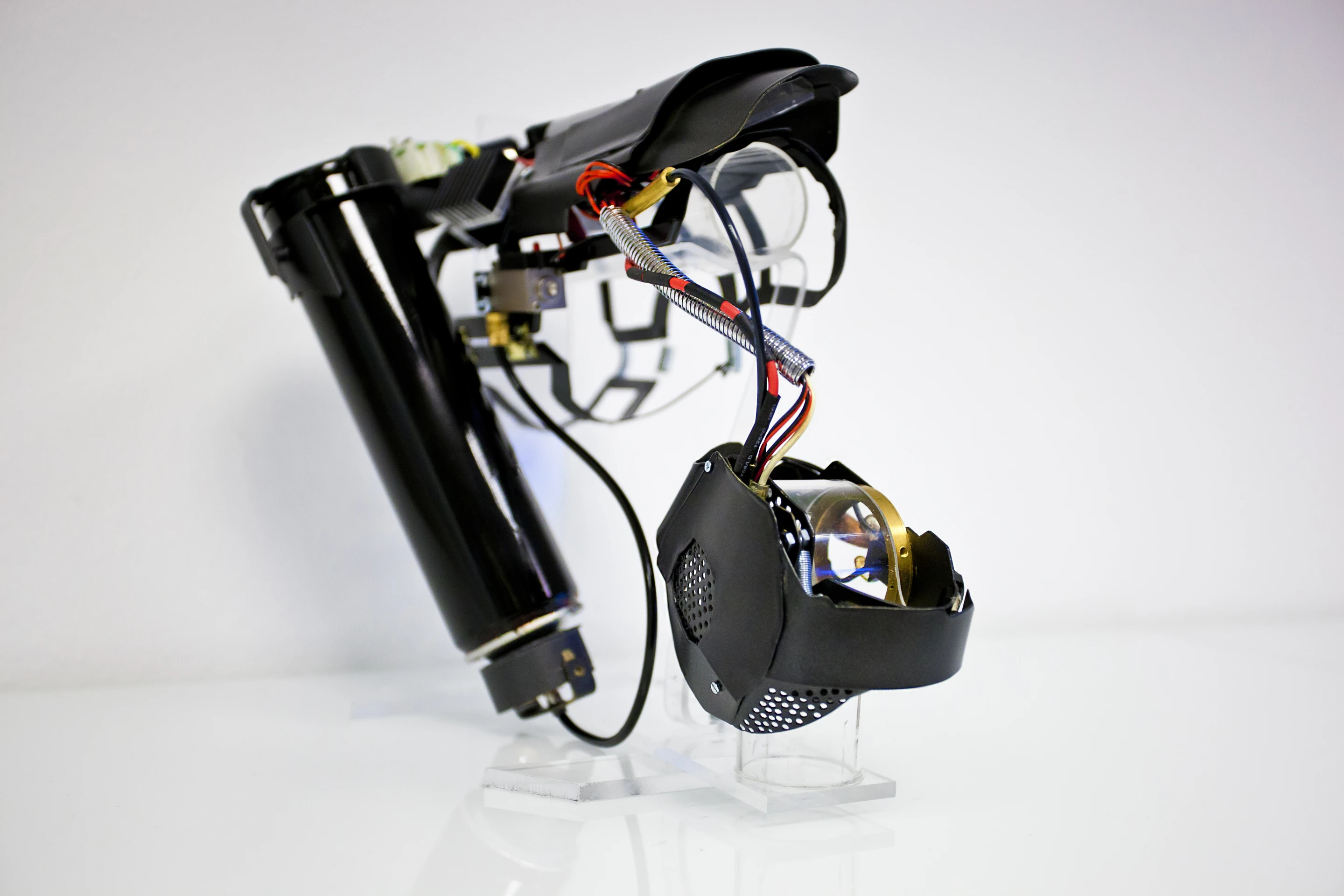 Cyberpunk weapons hobbyist Patrick Priebe's flame glove (arm gauntlet/fuel bottle is at the top, with the hand-mounted ignition module at the bottom right)