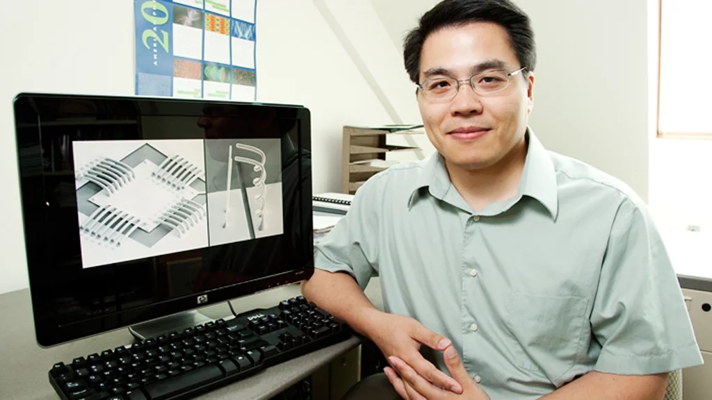 Min-Feng Yu, a professor of mechanical science and engineering, has developed a novel approach for manufacturing metal interconnects (Image: L. Brian Stauffer)