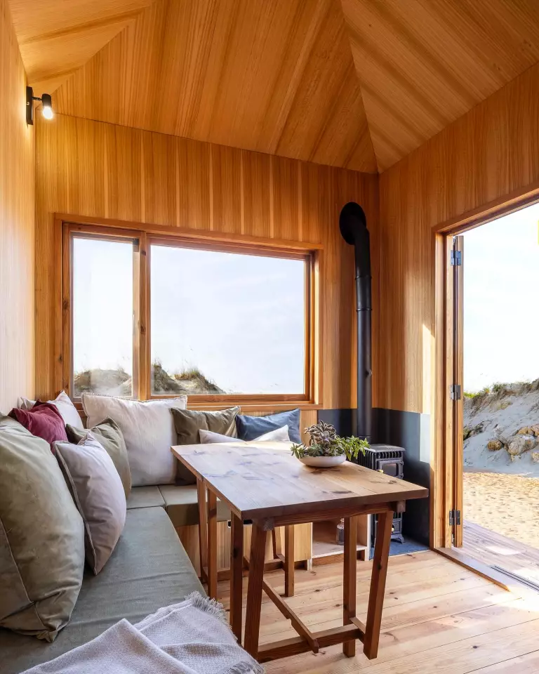 The Raposa's double doors help open up its living room to the outside