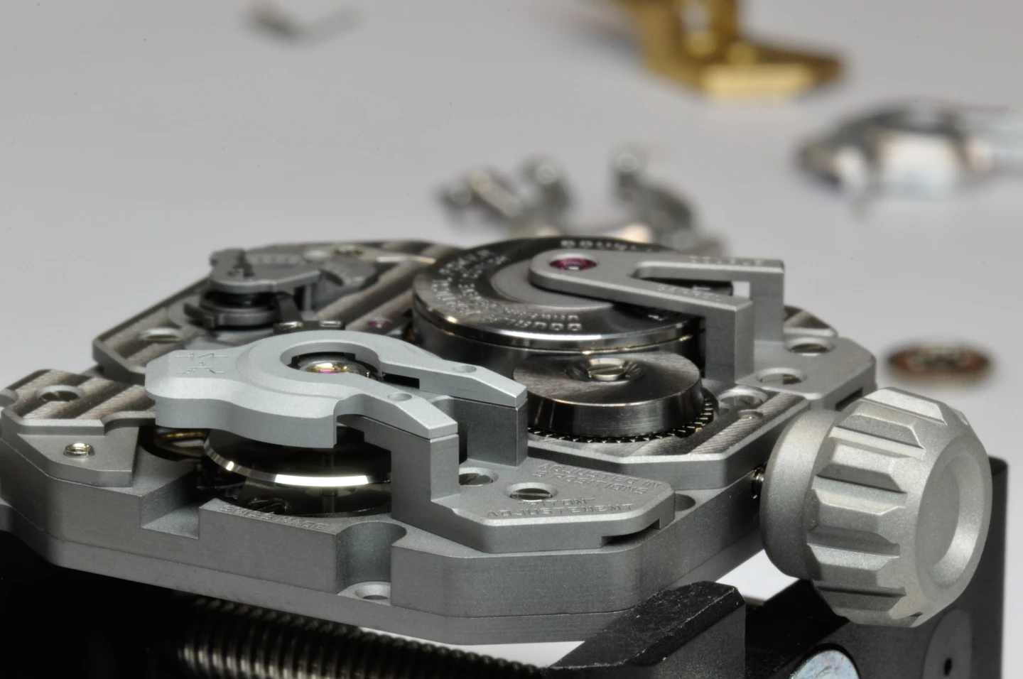 Pressing a button on the watch will trigger an optical sensor on the balance wheel to time its oscillations for about three seconds