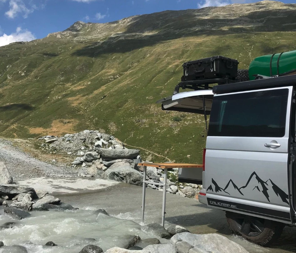 Cooking on a running river ... because now you can (though it looks a little cold, wet and slippery)