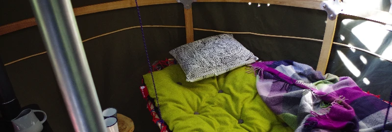 The interior of the Tree Tent can include a water storage tank and pump, underfloor battery pack, and a bio-fuel stove