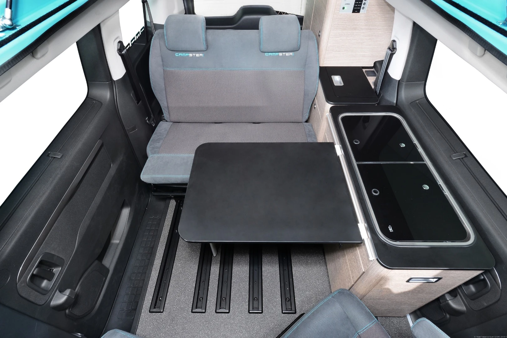The Campster's sliding rails let owners rearrange seating and camper furniture around different needs
