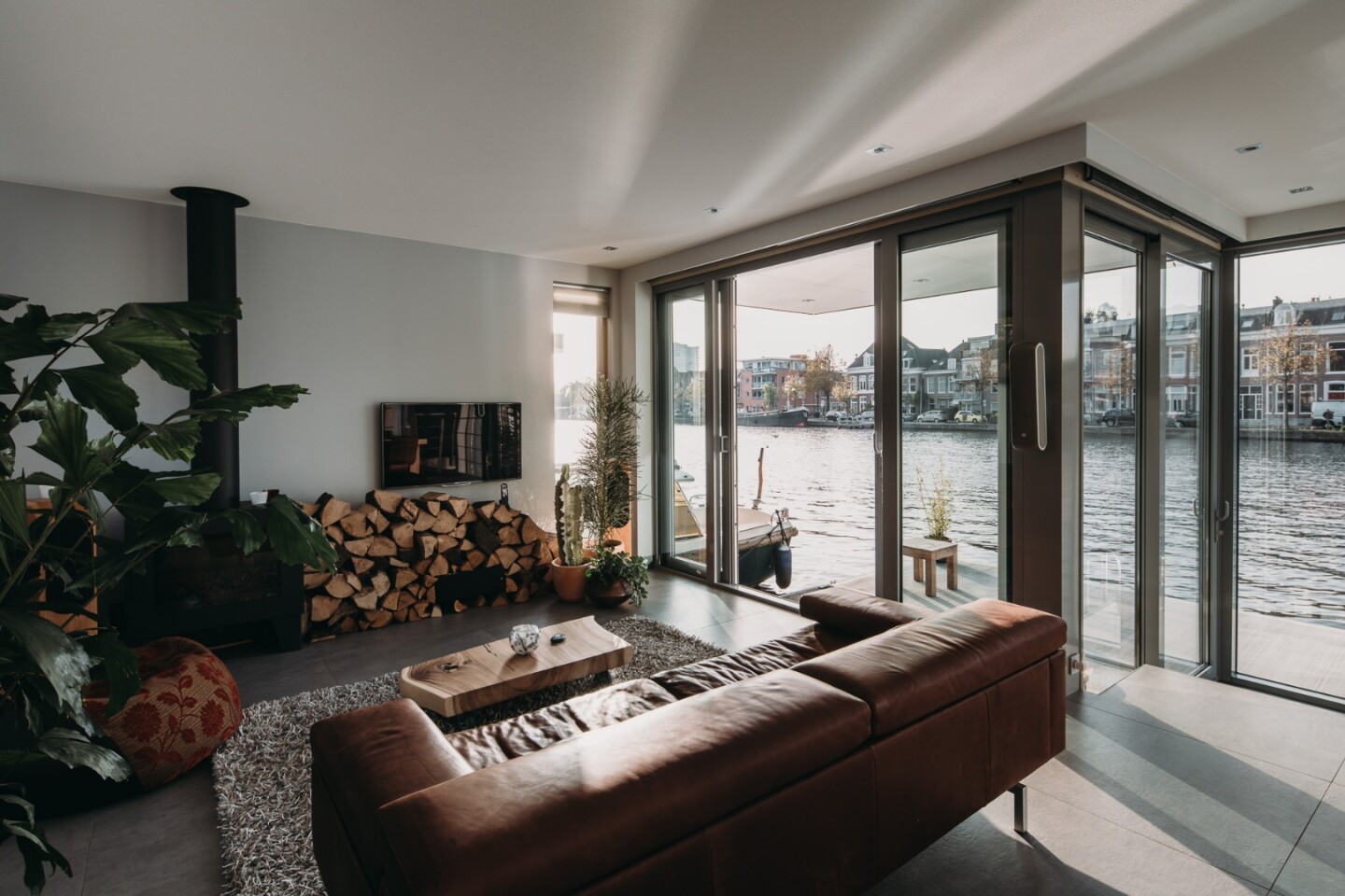 The Haarlem Shuffle features a large open plan living area with wooden fireplace