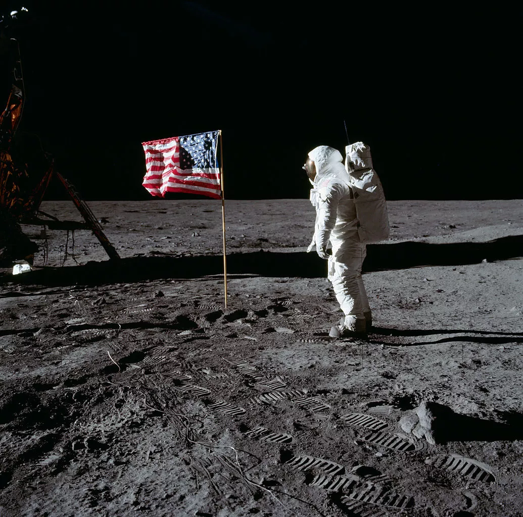 Buzz Aldrin planting a US flag on the Moon – for purely symbolic purposes of course