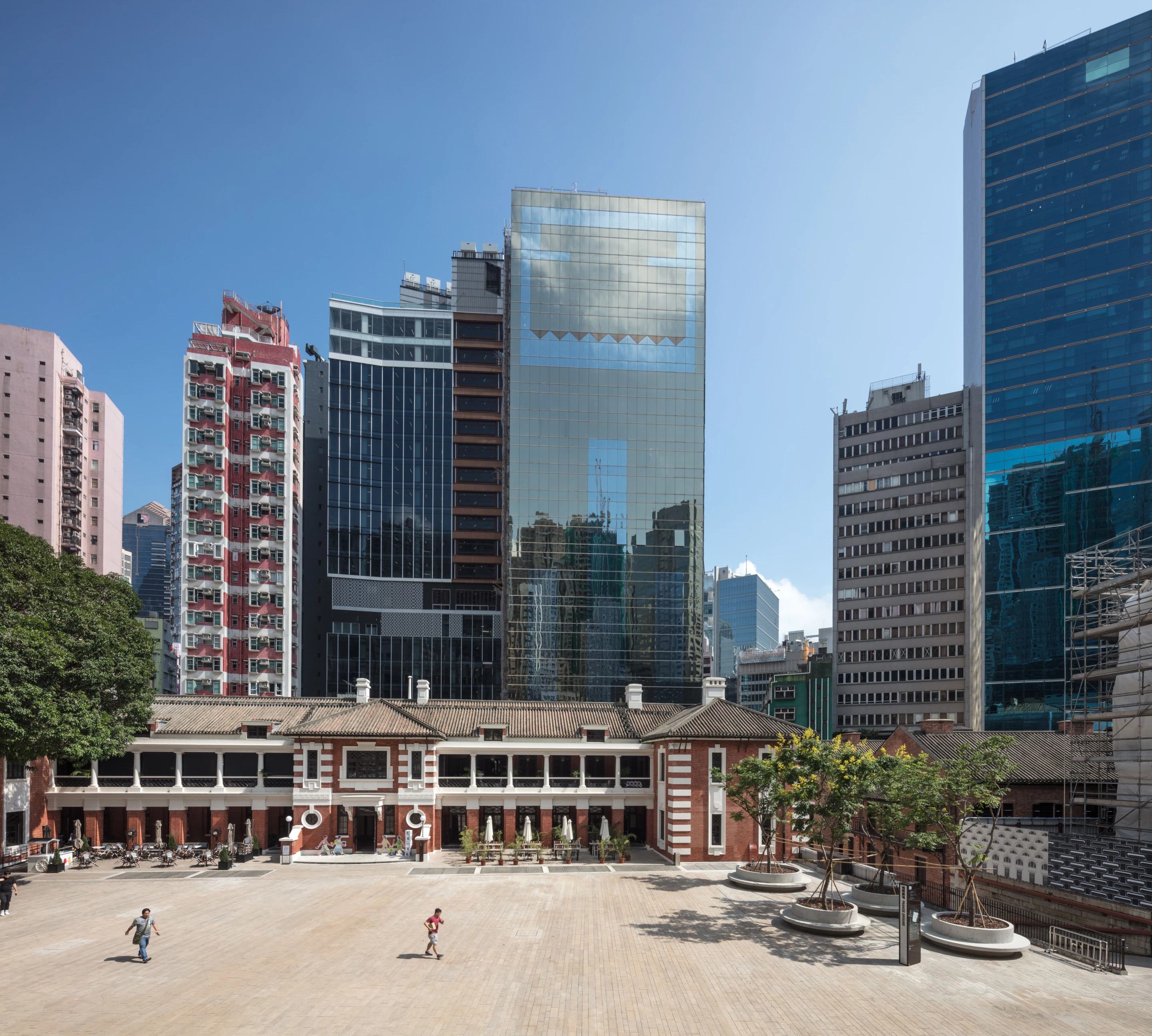 Tai Kwun - The Centre for Heritage and Arts, by Purcell, Herzog & de Meuron, Rocco Design Architects Associates Limited, is located in Hong Kong. It transformed a former police headquarters and prison into art and exhibition spaces, plus areas to practice Tai Chi