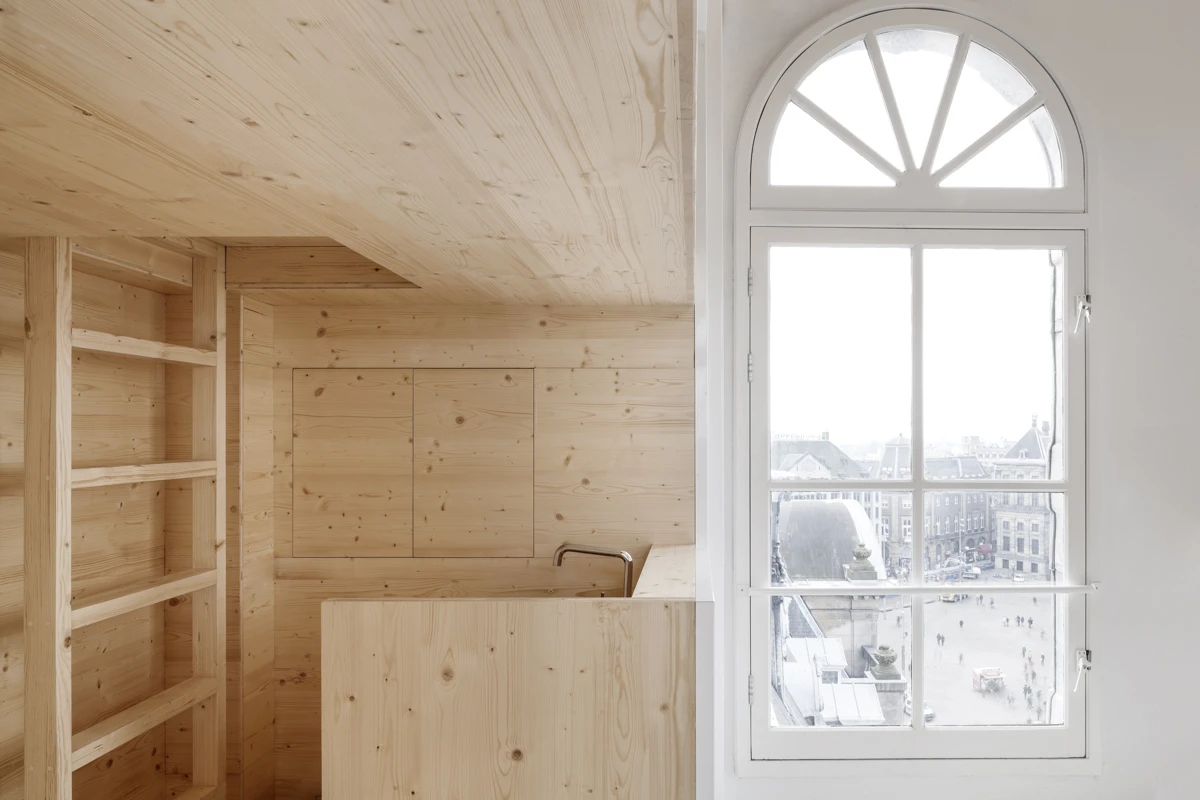 One section is painted all-white and includes a telescope and some furniture for the artist to relax and gaze out of the window (Photo: i29)