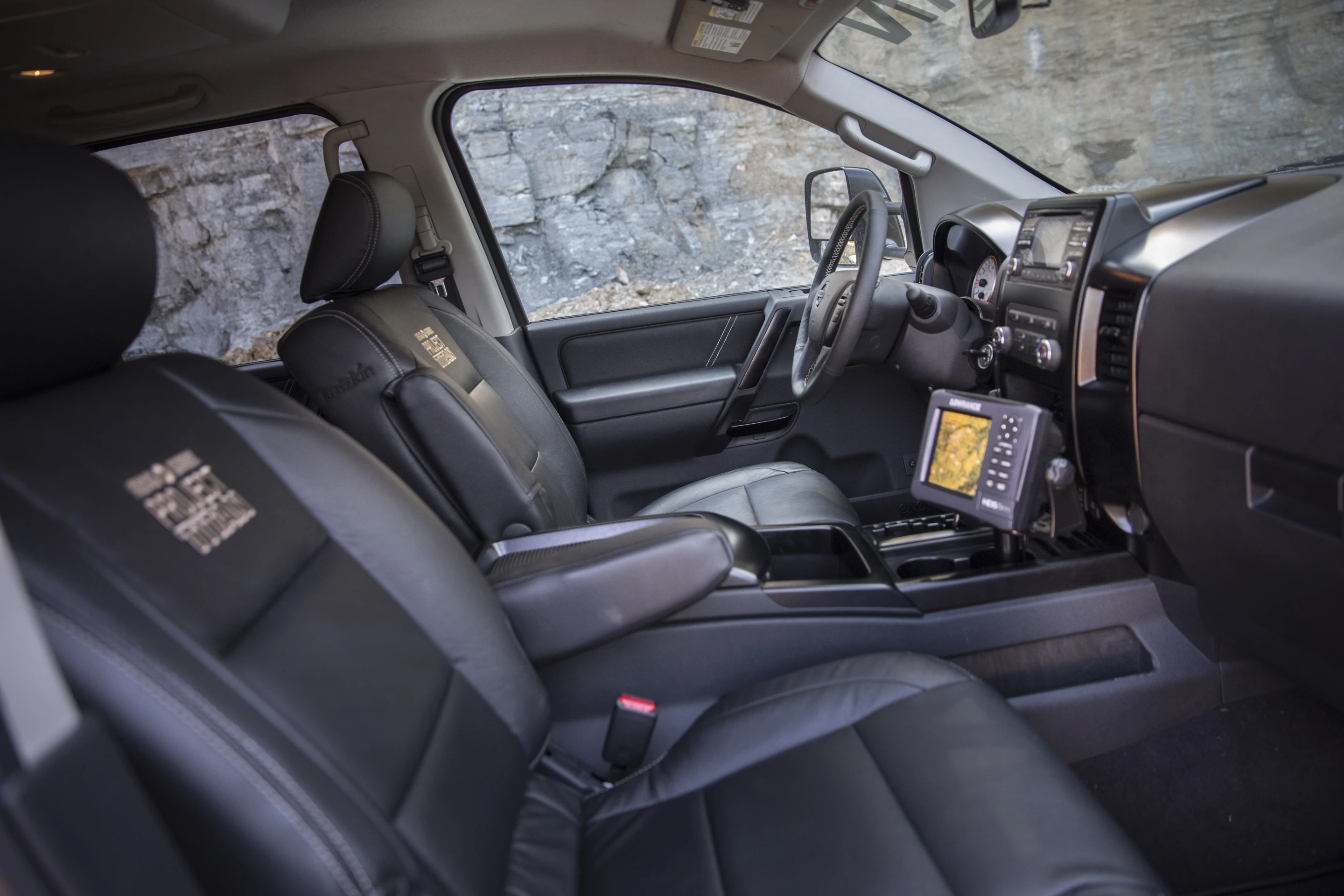 The interior includes Katzkin leather seats