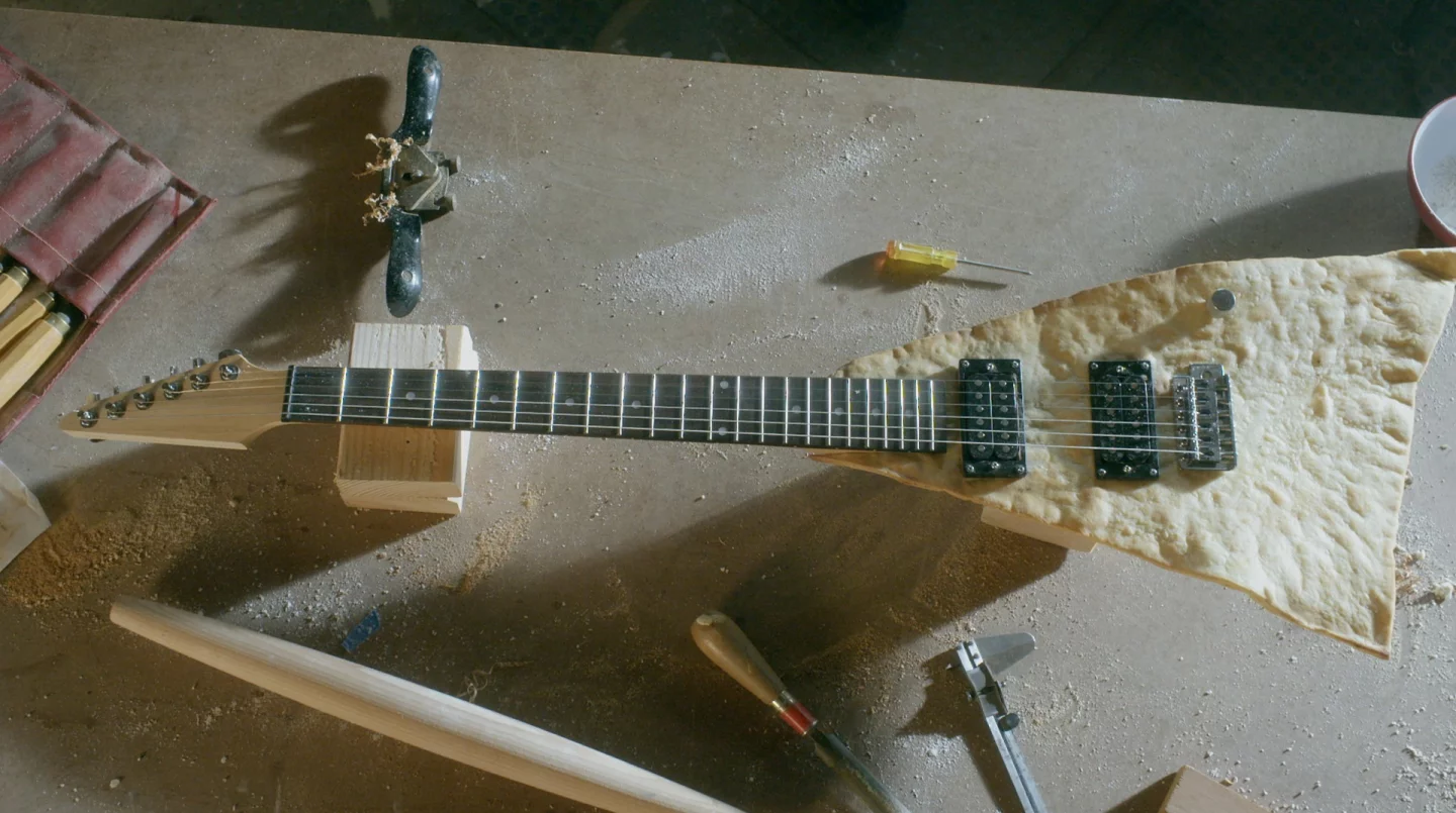 The Tortilla Chip Guitar was designed, cooked and put together by Scott Feldman and his team at Atlanta Props
