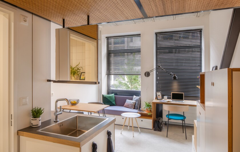 The Hermes City Plaza apartments feature a sink that serves both bathroom and kitchen