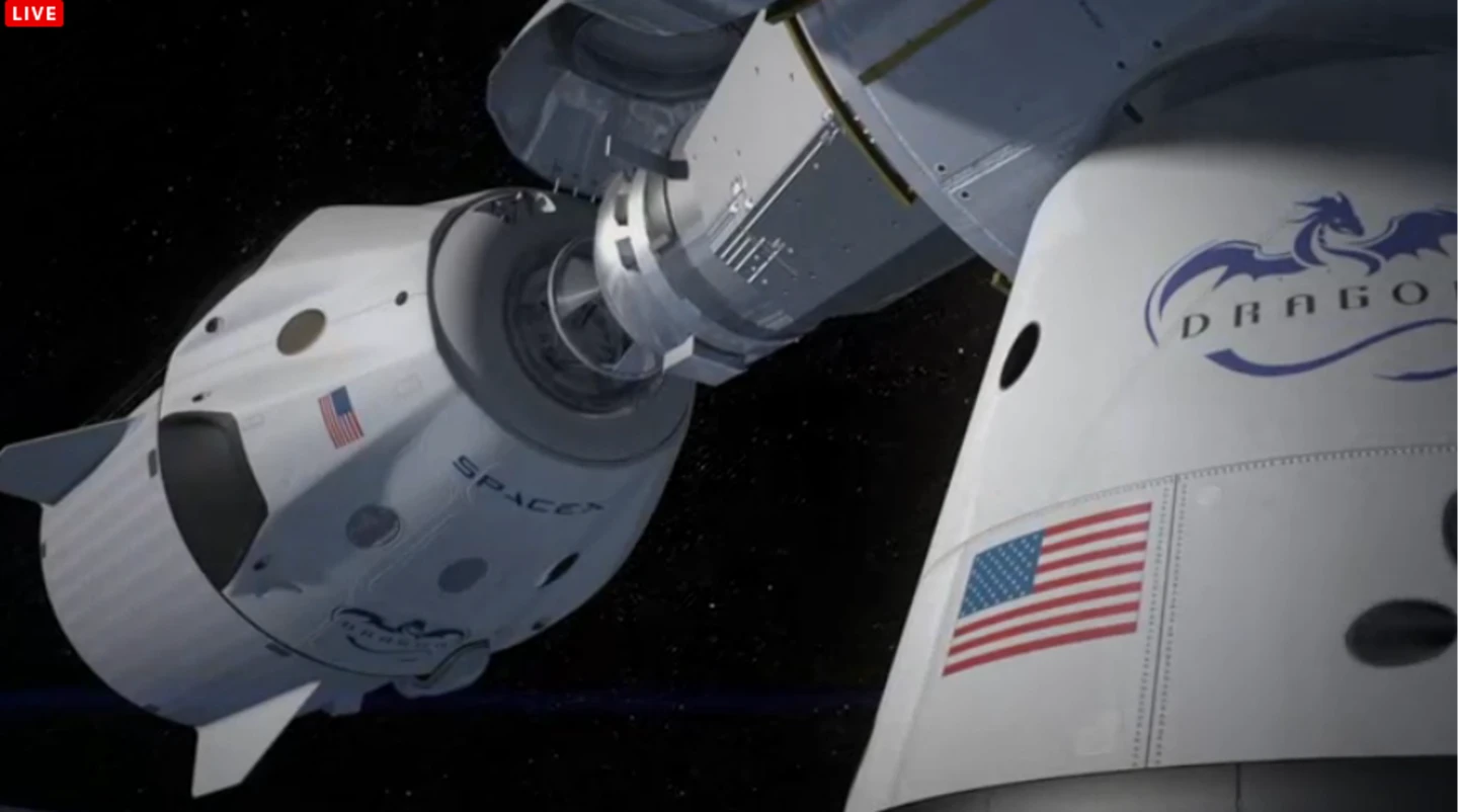 Animation still of the Dragon V2 docking with the ISS