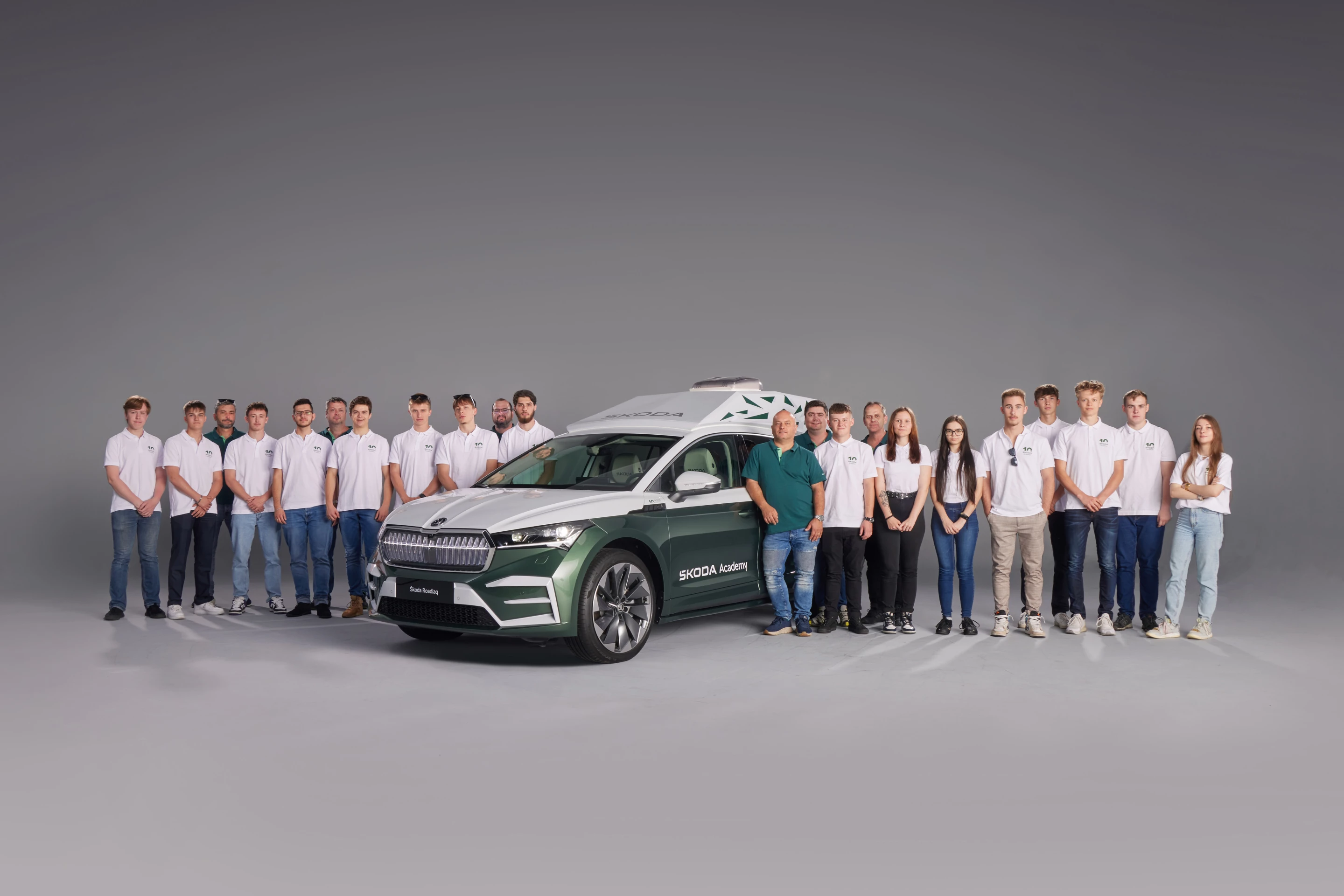 Skoda students and employees gather around their creation