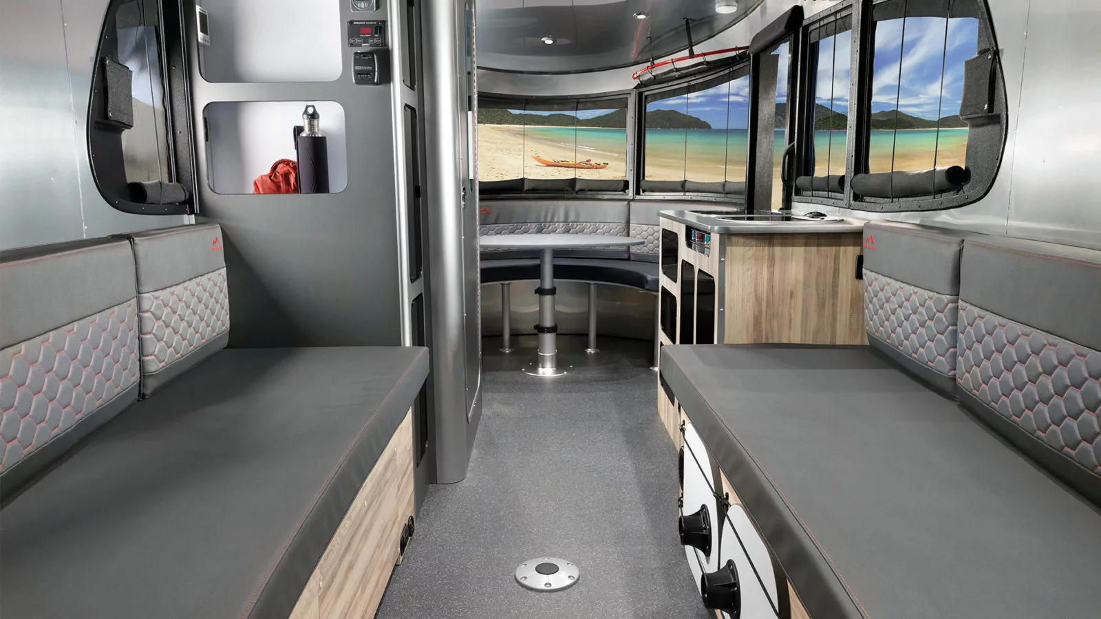 The Basecamp 20 loses the panoramic front kitchen of the Basecamp 16, but the panoramic front dining lounge isn't so bad, either