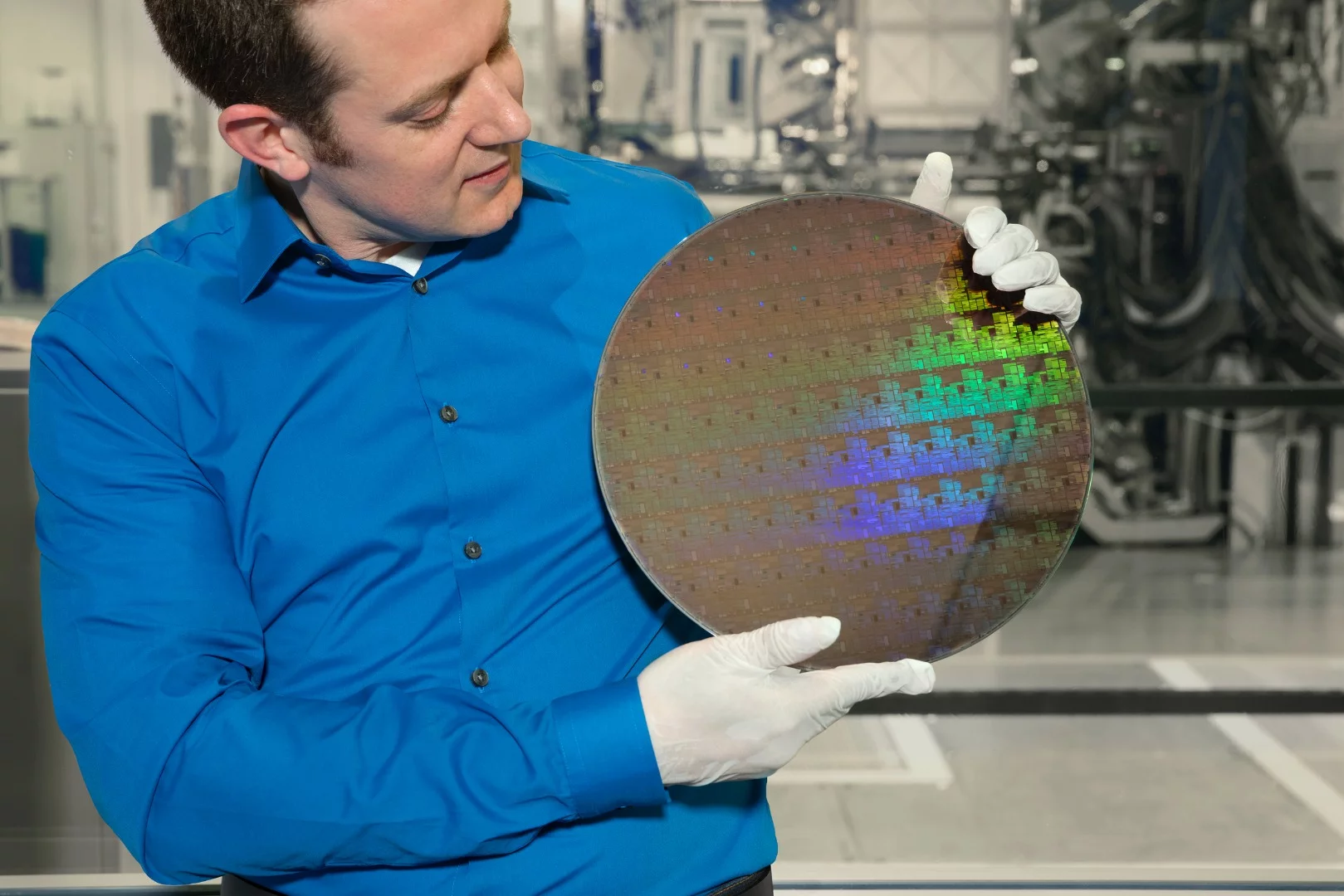 IBM researcher Nicolas Loubet holds a wafer of the new 5nm chips