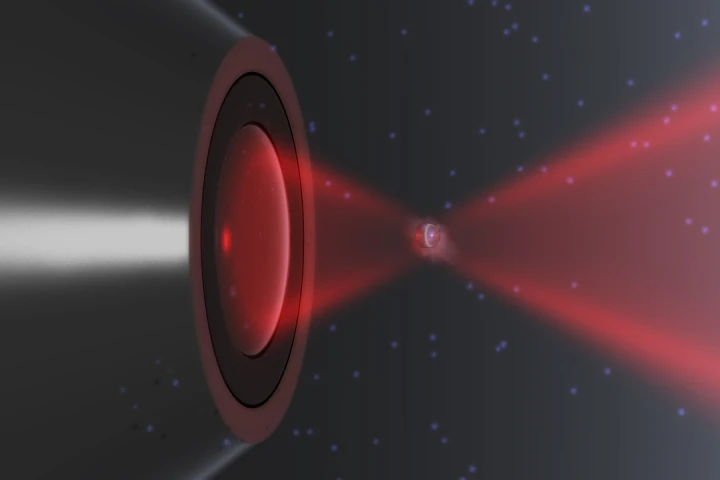 A rendering of a nanoparticle trapped in a laser and in thermal non-equilibrium (Image: Iñaki Gonzalez and Jan Gieseler)