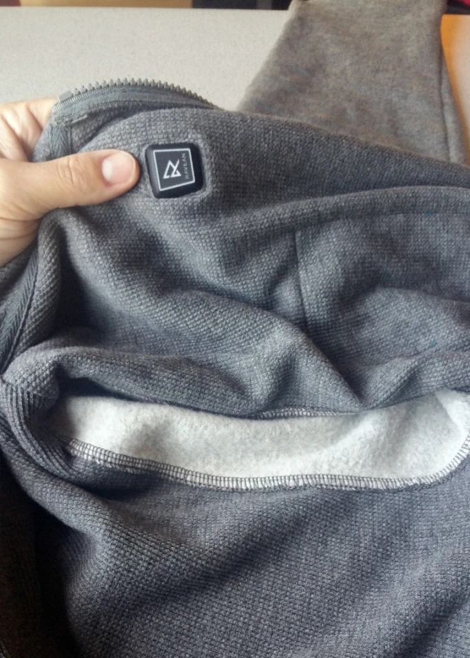 The power button to activate the heating elements is located on the inside, left of the main zipper