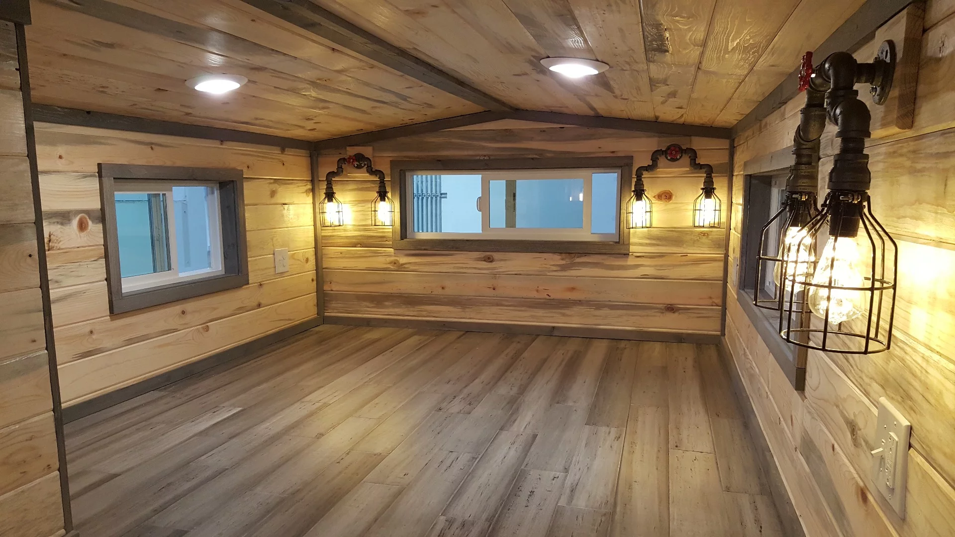 The Tiny Giant's loft is particularly large for a tiny house, though is still low-ceilinged