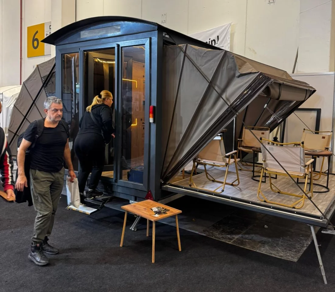 Ortsan shows the Mini House Caravan at an RV fair