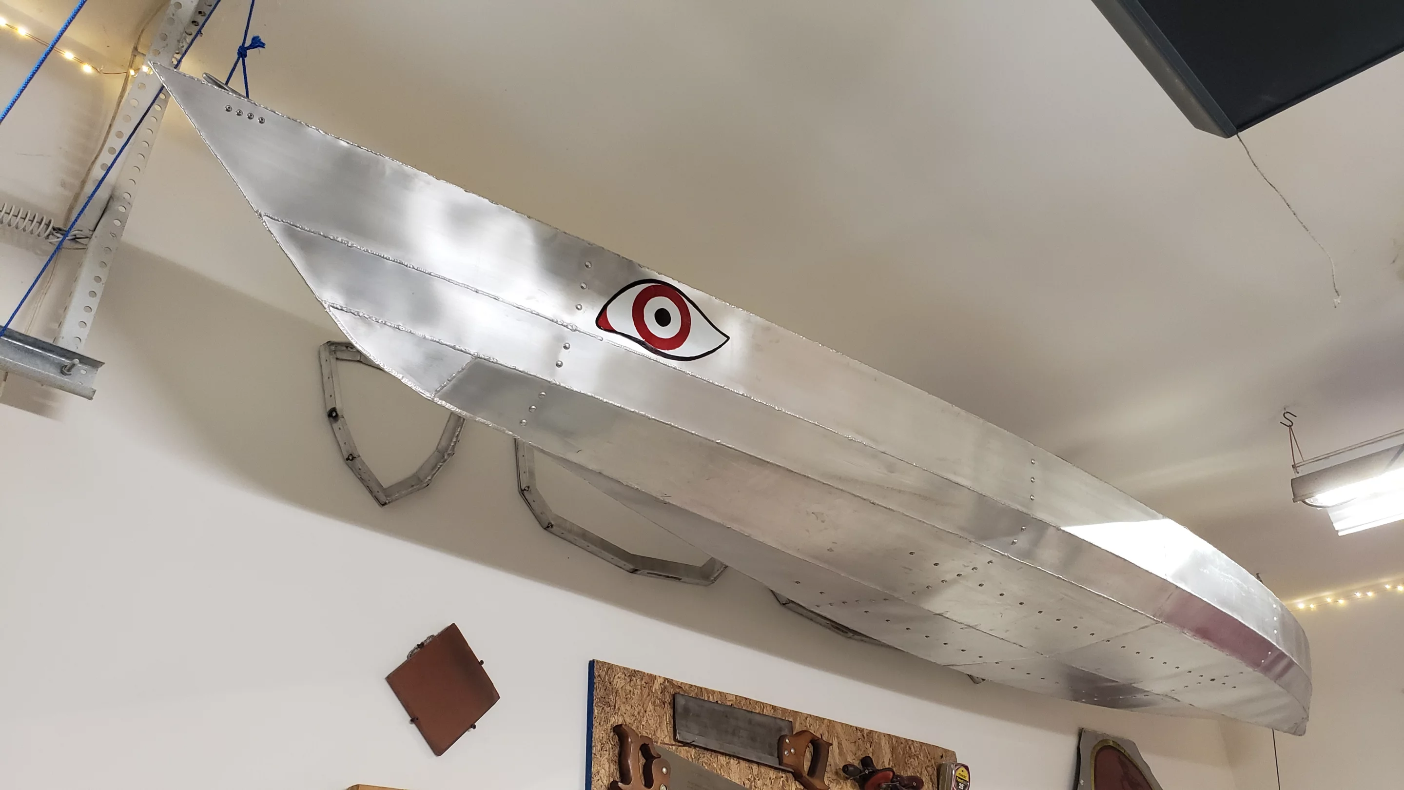 The completed kayak sports a spiffy brushed aluminum finish – along with a pair of ancient-Greek-trireme eyes