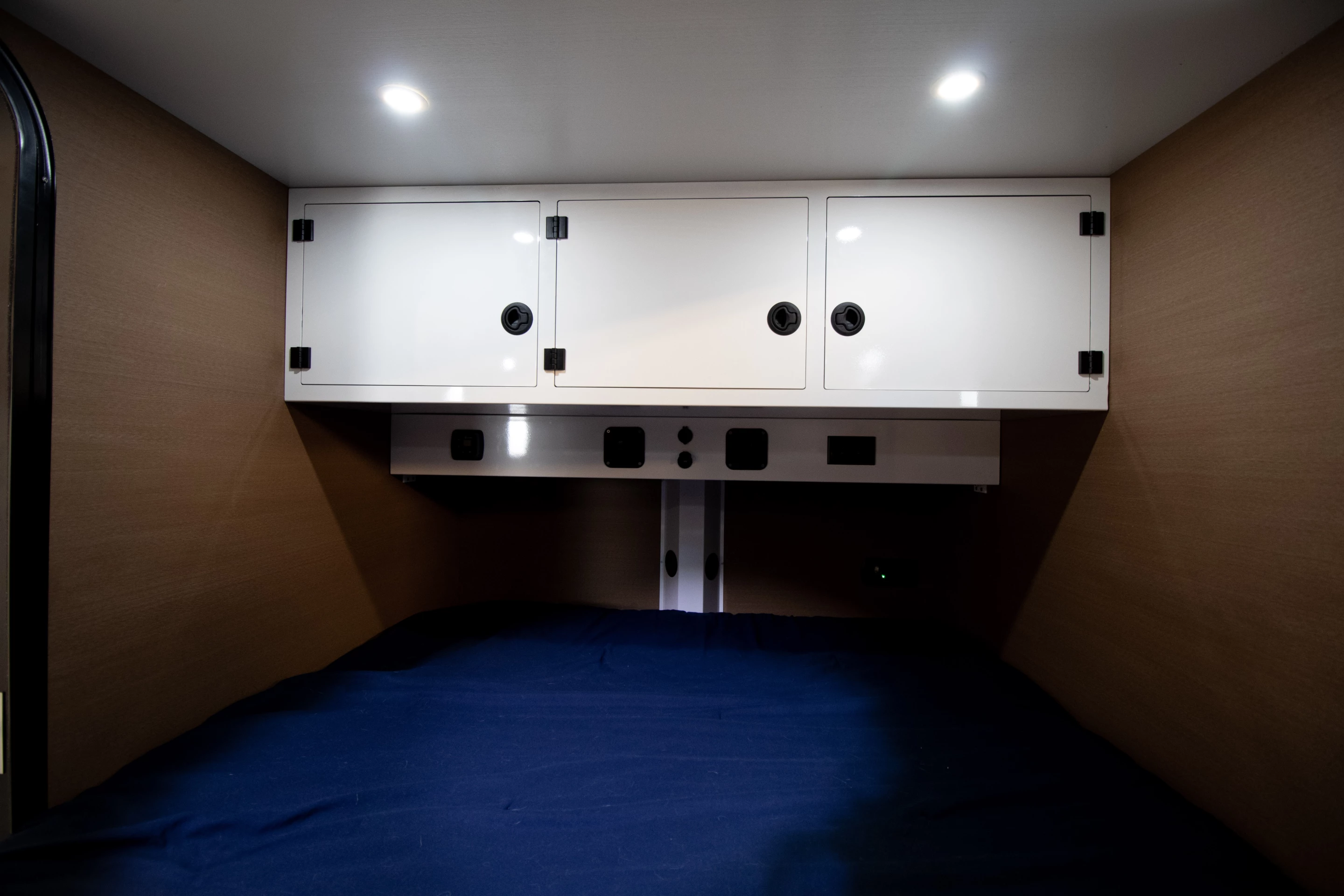 Cabinets over the foot of the Sasquatch Highland 60 bed