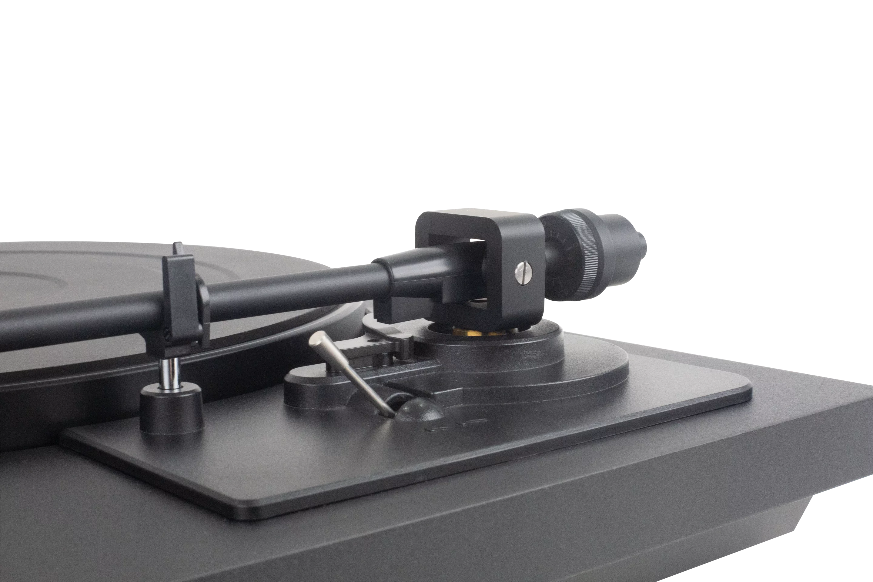 The platter will start to spin when the tonearm is raised, which will return to its cradle at the end of a record