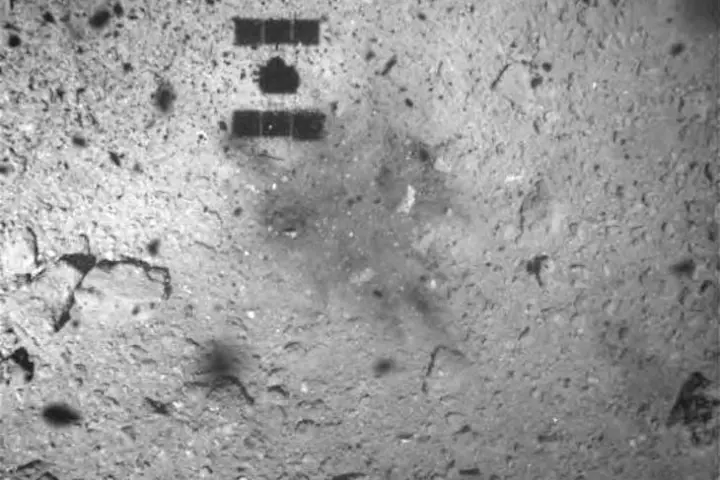 An image captured by the Hayabusa 2 spacecraft shows discoloring on the surface of Ryugu after touchdown