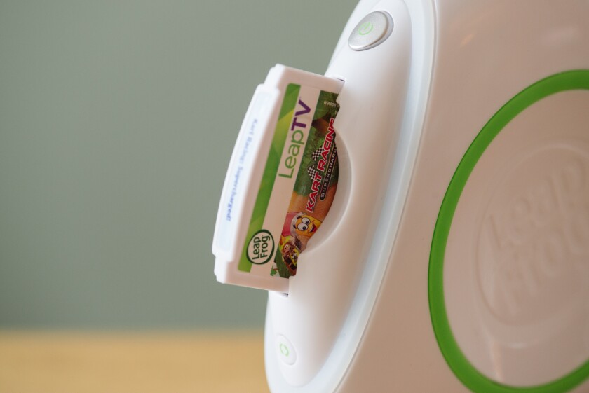 A game cartridge in the LeapFrog LeapTV (Photo: Simon Crisp/Gizmag.com)