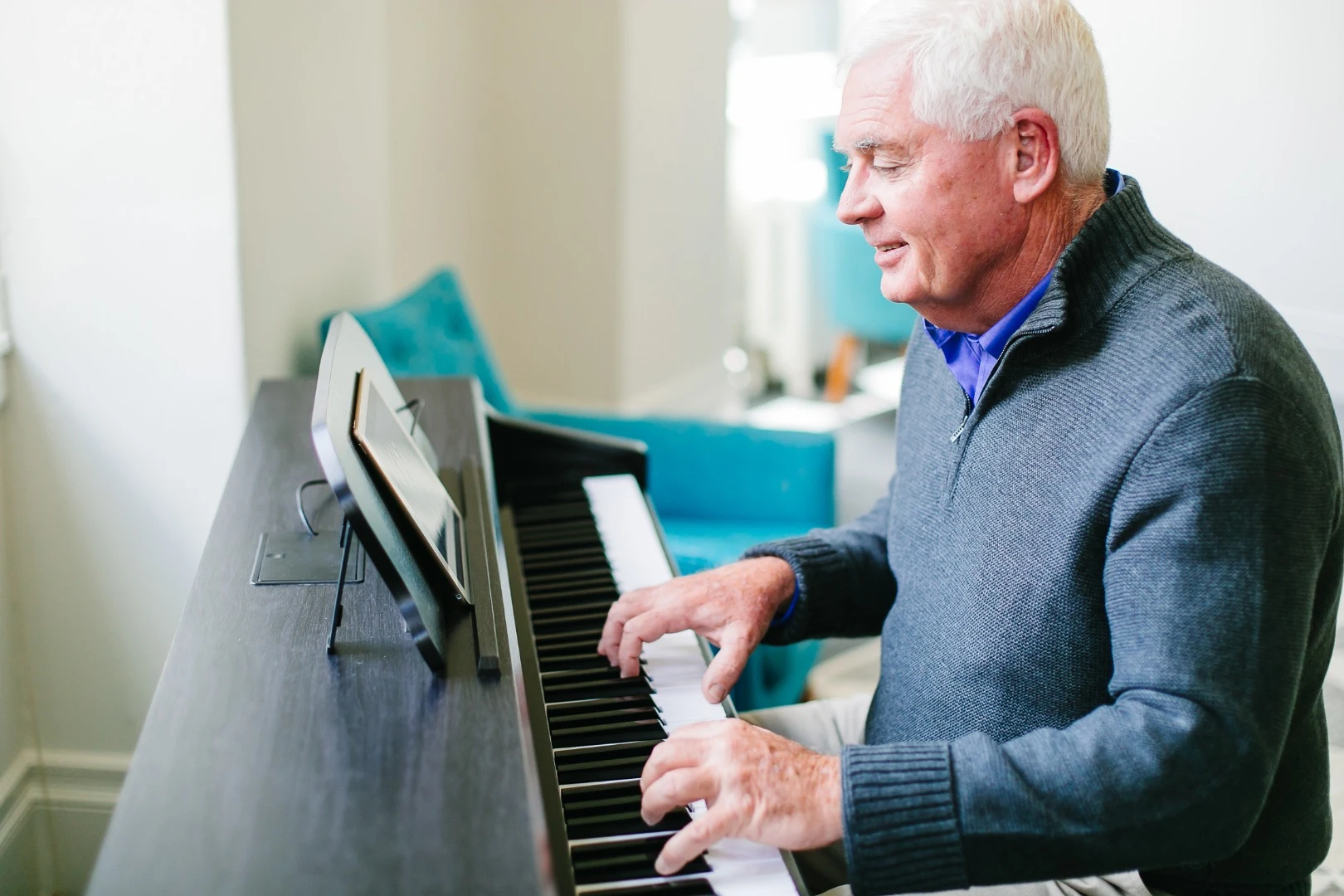 Students young or old learn using a free iOS/Android app that's synced with an LED light system on the piano