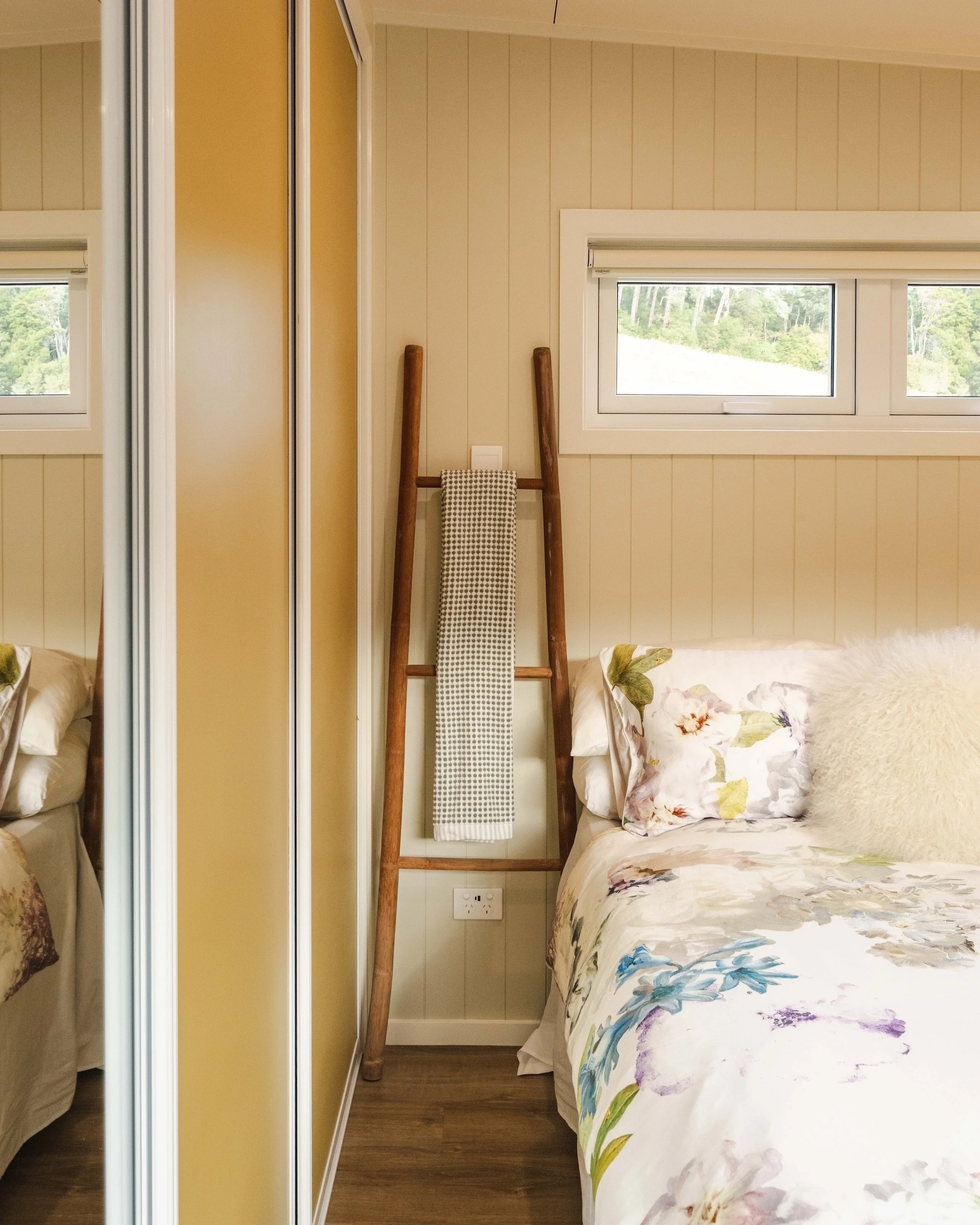 The English Garden's bedroom has a double bed and ample headroom to stand upright, which is always a benefit in a tiny house