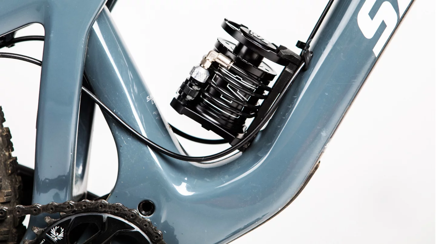 Using an included frame dock and safety strap, the 185-gram Stompump can be mounted on a bike's water bottle bosses