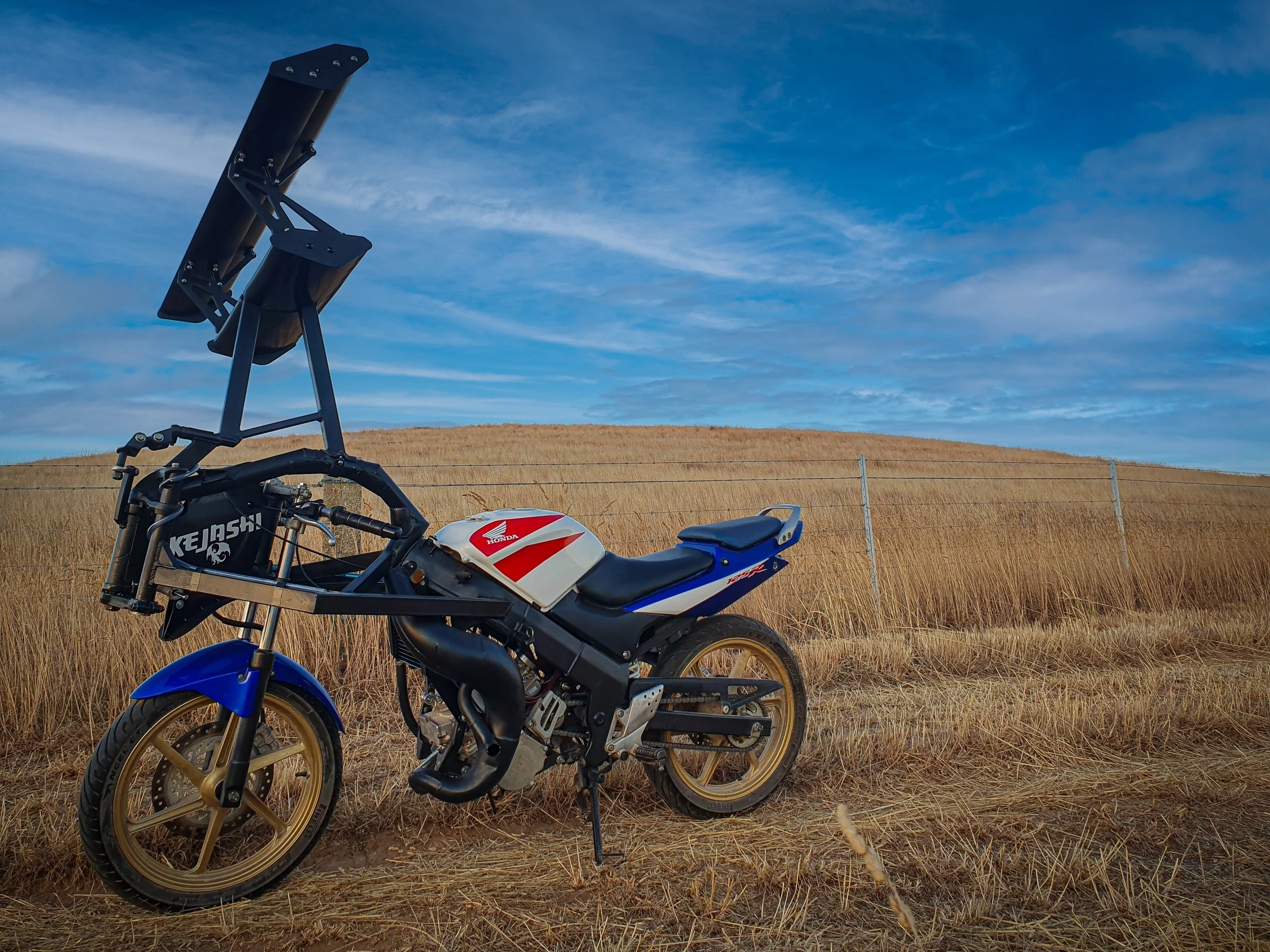 Yes, a tilt-wing motorcycle. And the wing might not be the oddest thing about this wild machine