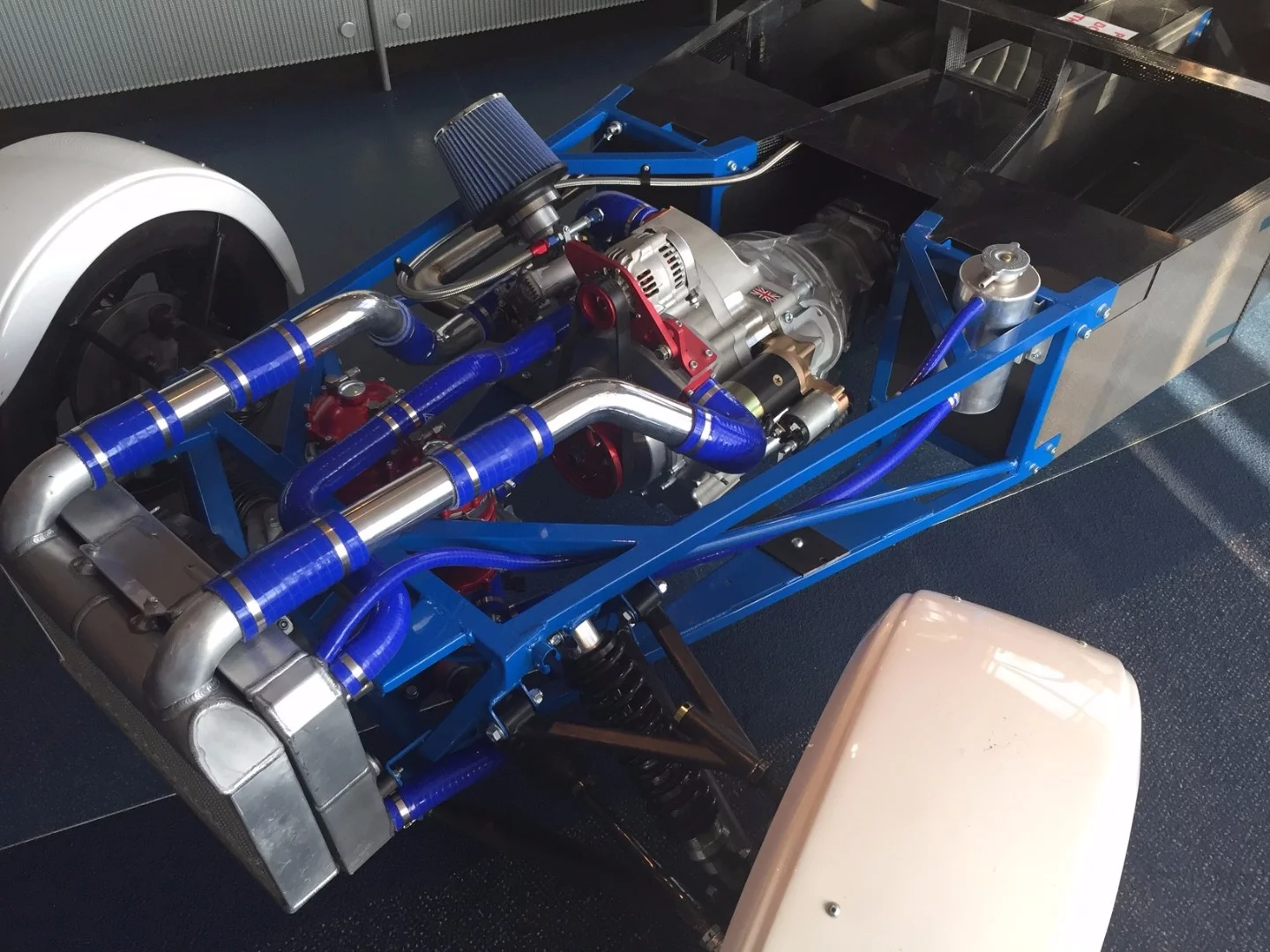 The collaboration utilizes Westfield's roadster, Axon's carbon fiber frame structure and AIE's rotary engine