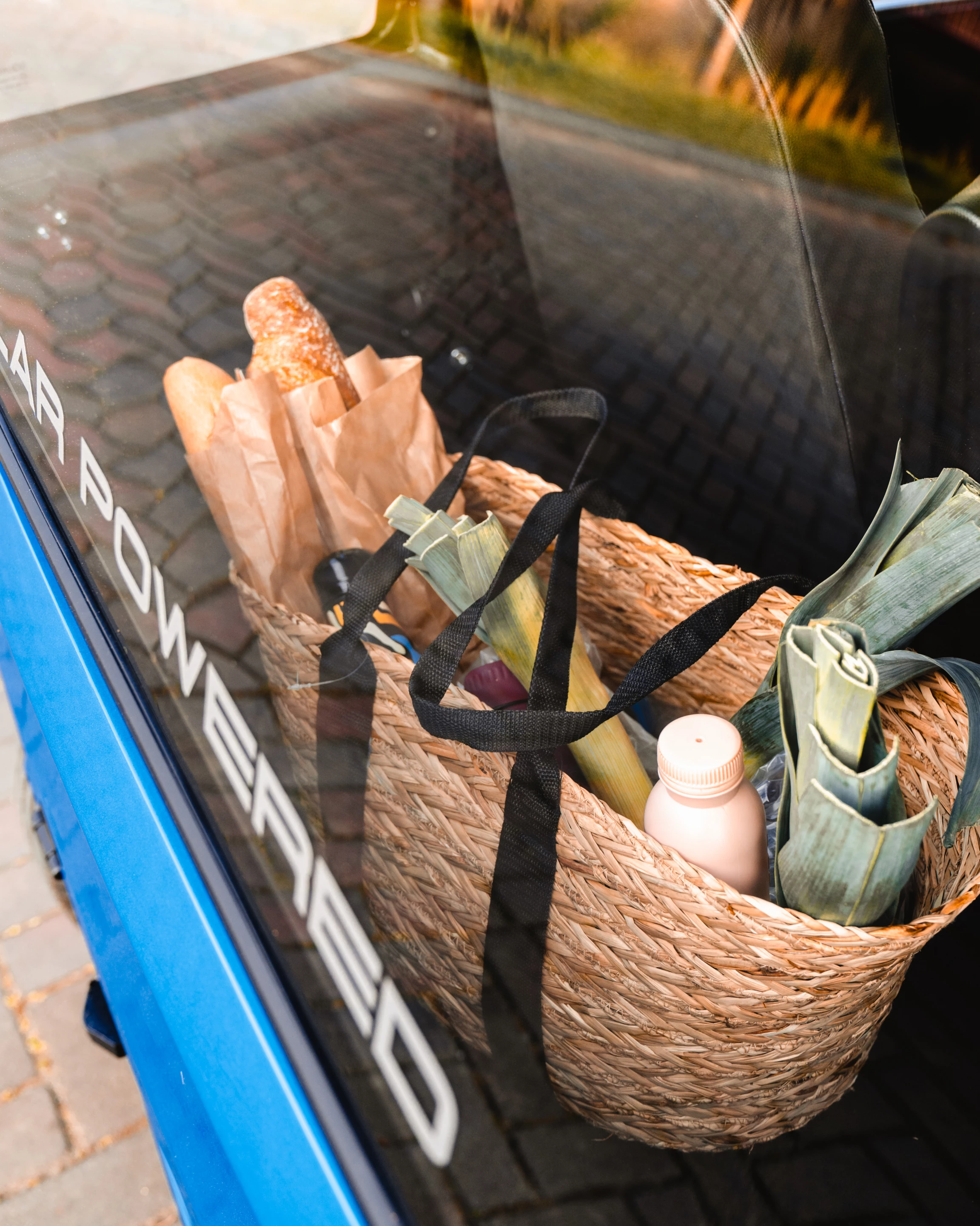 Groceries in the compact trunk area