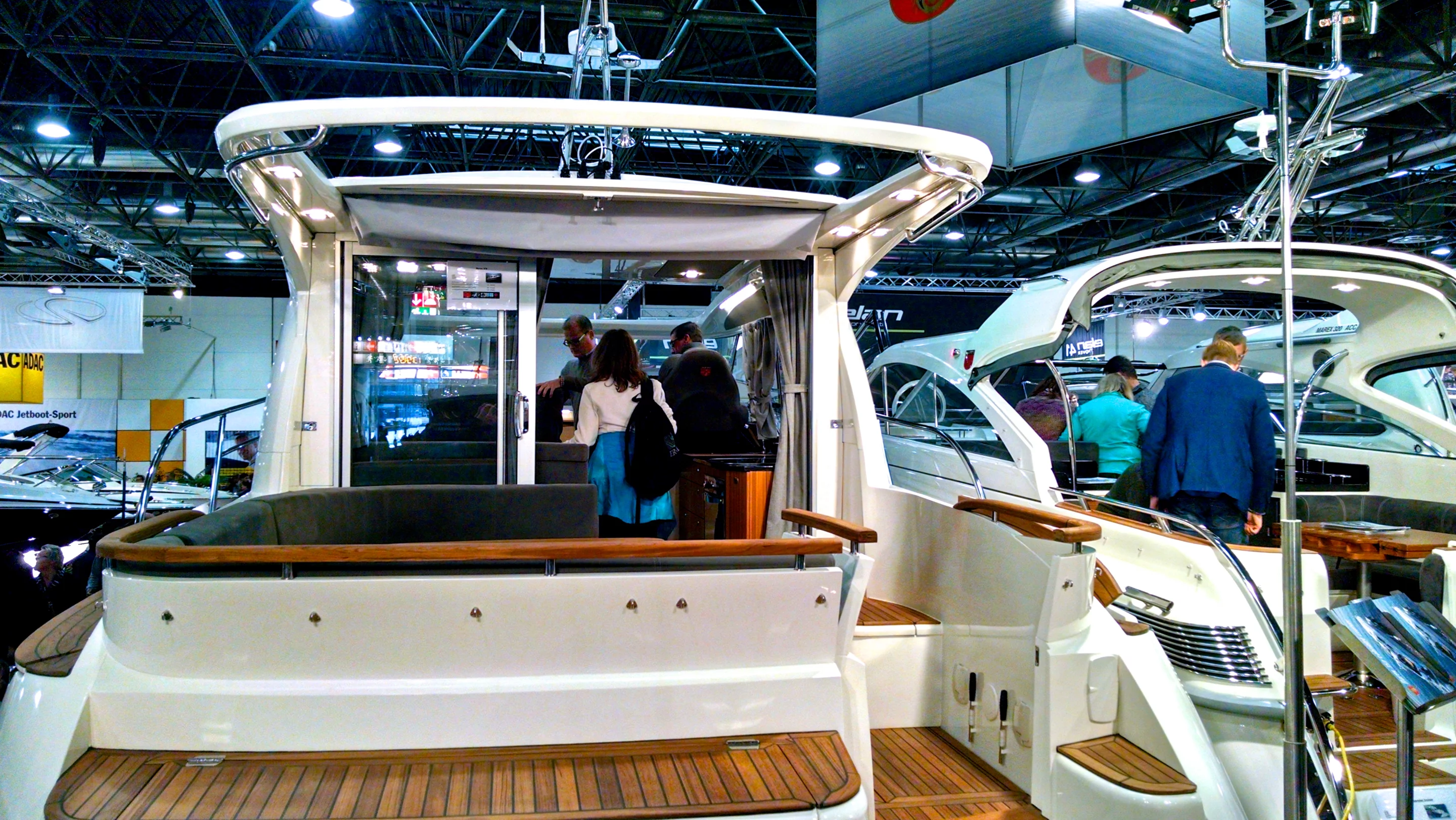 The new Marex 375 features two sliding tops and roof-mounted solar panels between them (Photo: C.C. Weiss/Gizmag)