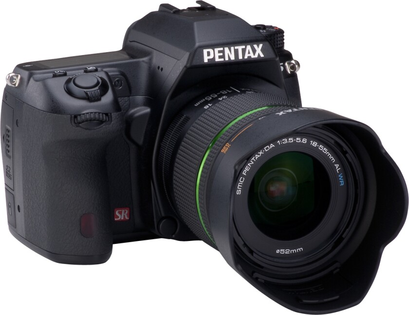 The K-5 has a new, faster 11 point (9 cross) SAFOX IX autofocus system with dedicated AF assist lamp and light wavelength sensor