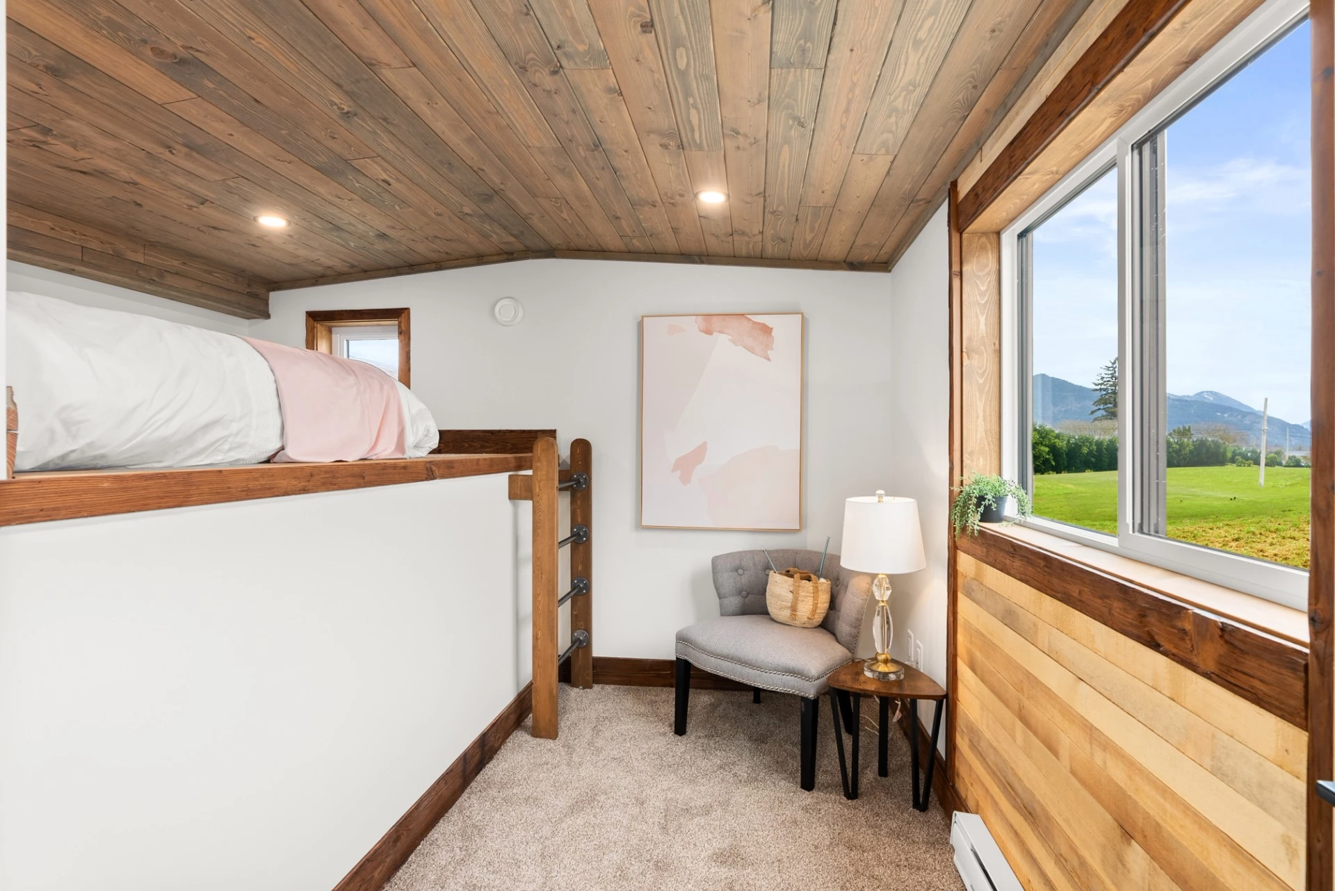 The Cypress includes an upstairs bedroom with space to stand upright, though the owner still needs to climb into bed