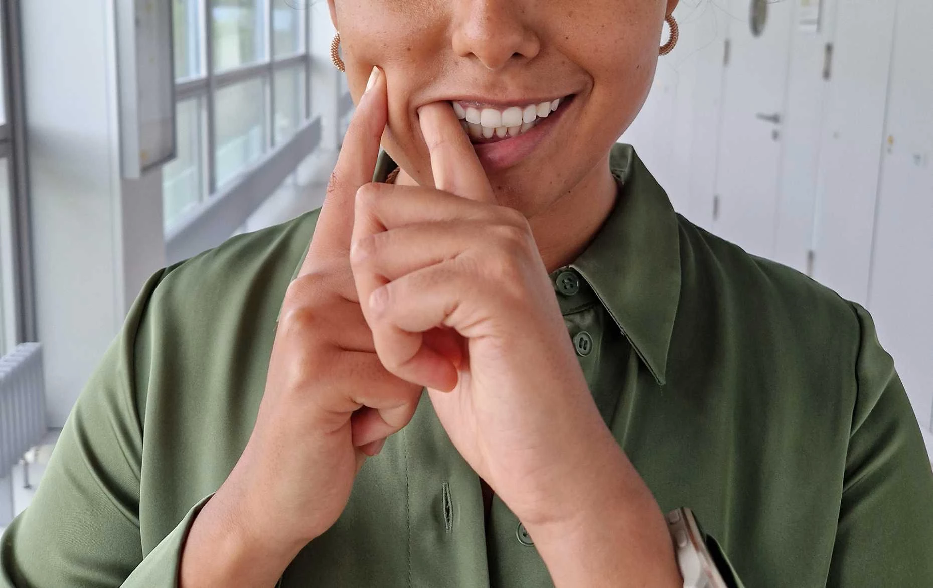 The patient applies the suction cup using two fingers