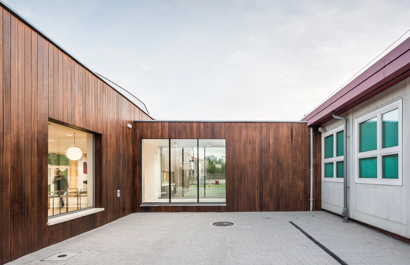 Structurally, Kindergarten consists of reinforced concrete walls clad in timber panels