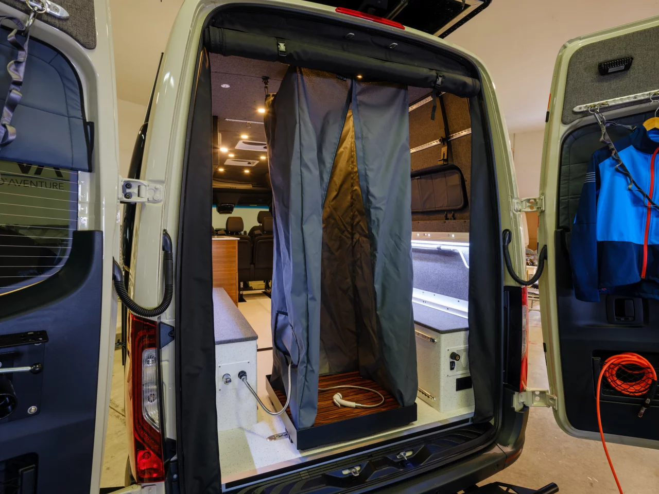 Shower curtain up, ready to wash off the side effects of the day's adventure