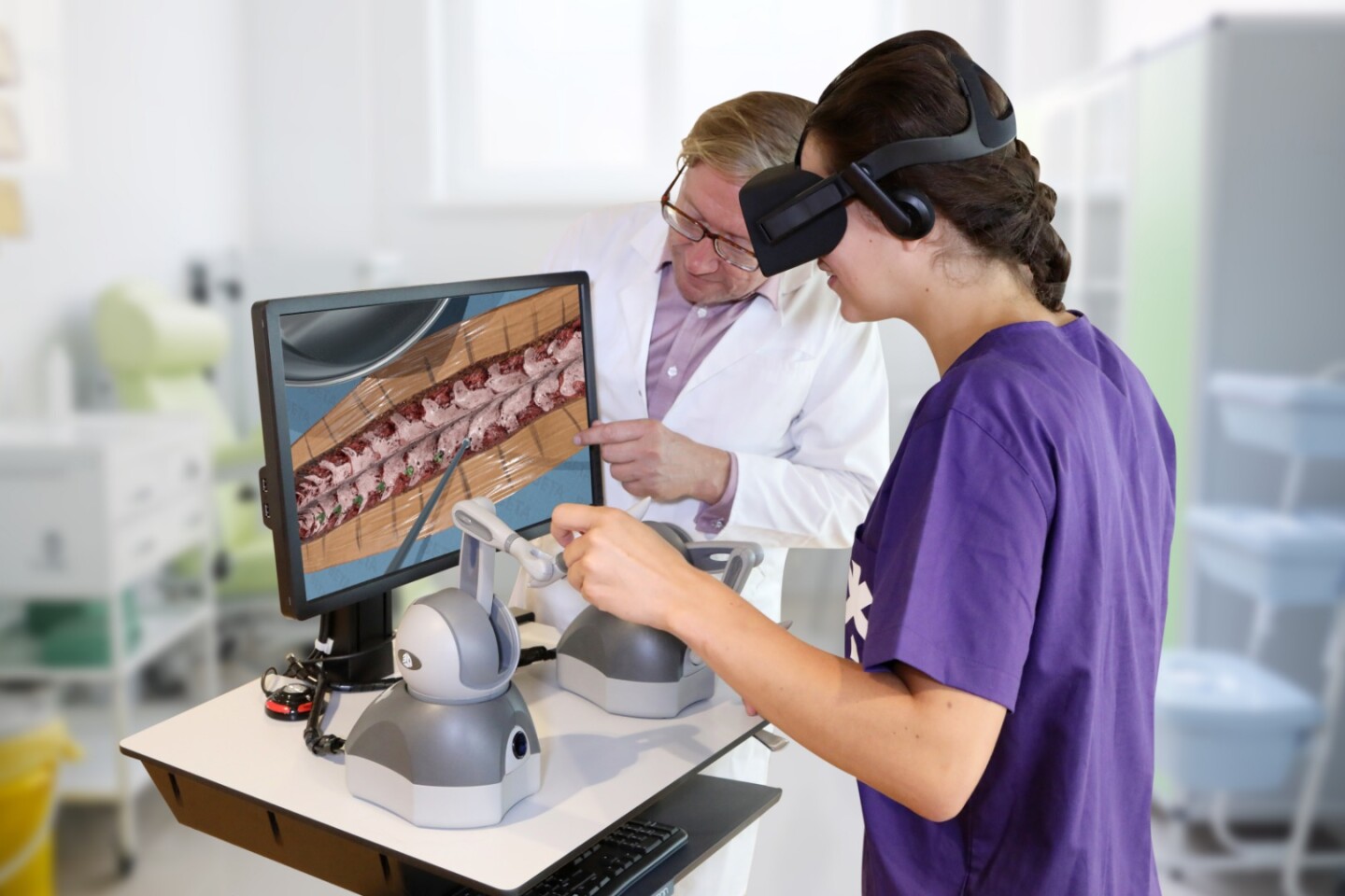 A student uses the Fundamental Surgery system to perform a virtual spinal operation