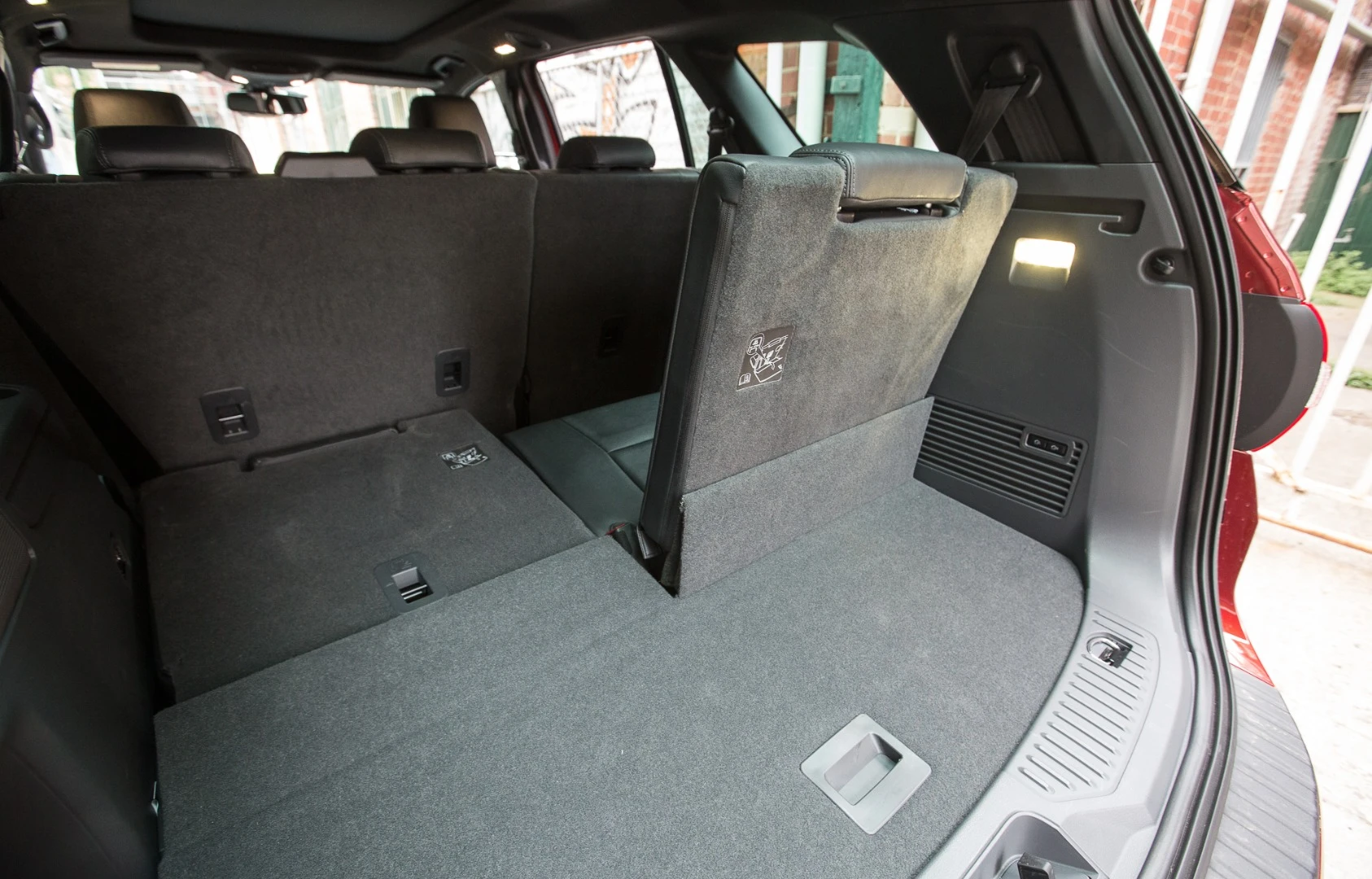 Access to (and sitting) in the third row is a bit ungainly, but ample for young agile types in a pinch - which is what it's for