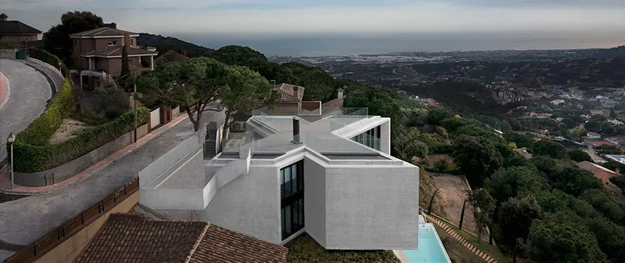 X House from Cadaval & Solà-Morales is a unique building, shaped so as to make the most of the incredible landscape surrounding its plot